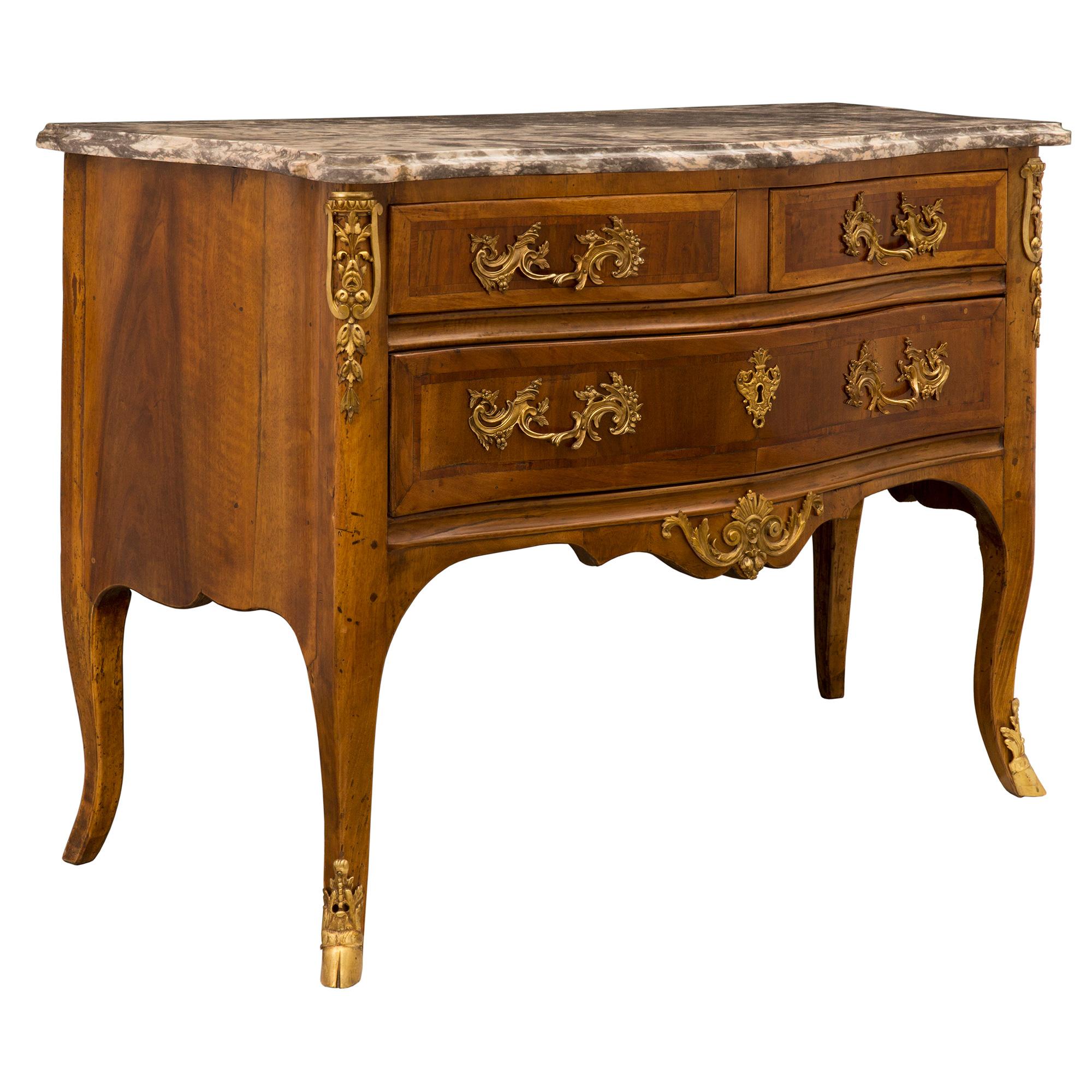 Regency French 18th Century Régence Period Walnut, Fruitwood, Ormolu, and Marble Commode For Sale