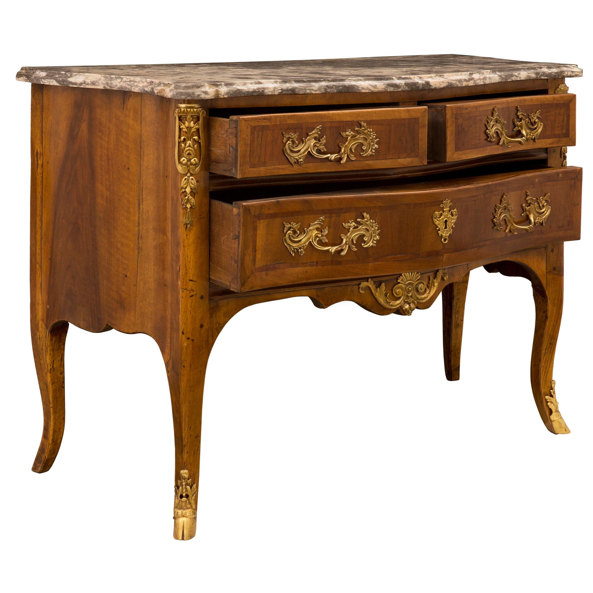 French 18th Century Régence Period Walnut, Fruitwood, Ormolu, and Marble Commode In Good Condition For Sale In West Palm Beach, FL