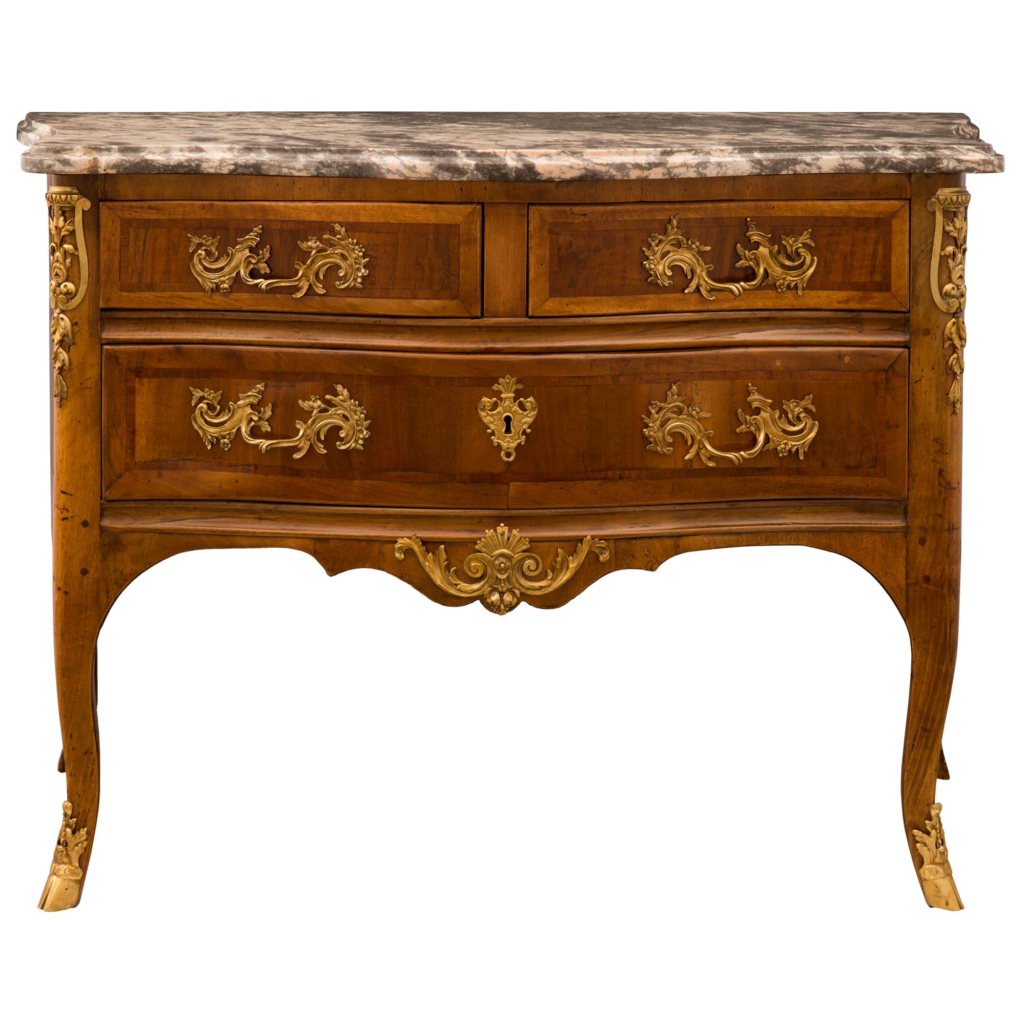 French 18th Century Régence Period Walnut, Fruitwood, Ormolu, and Marble Commode For Sale
