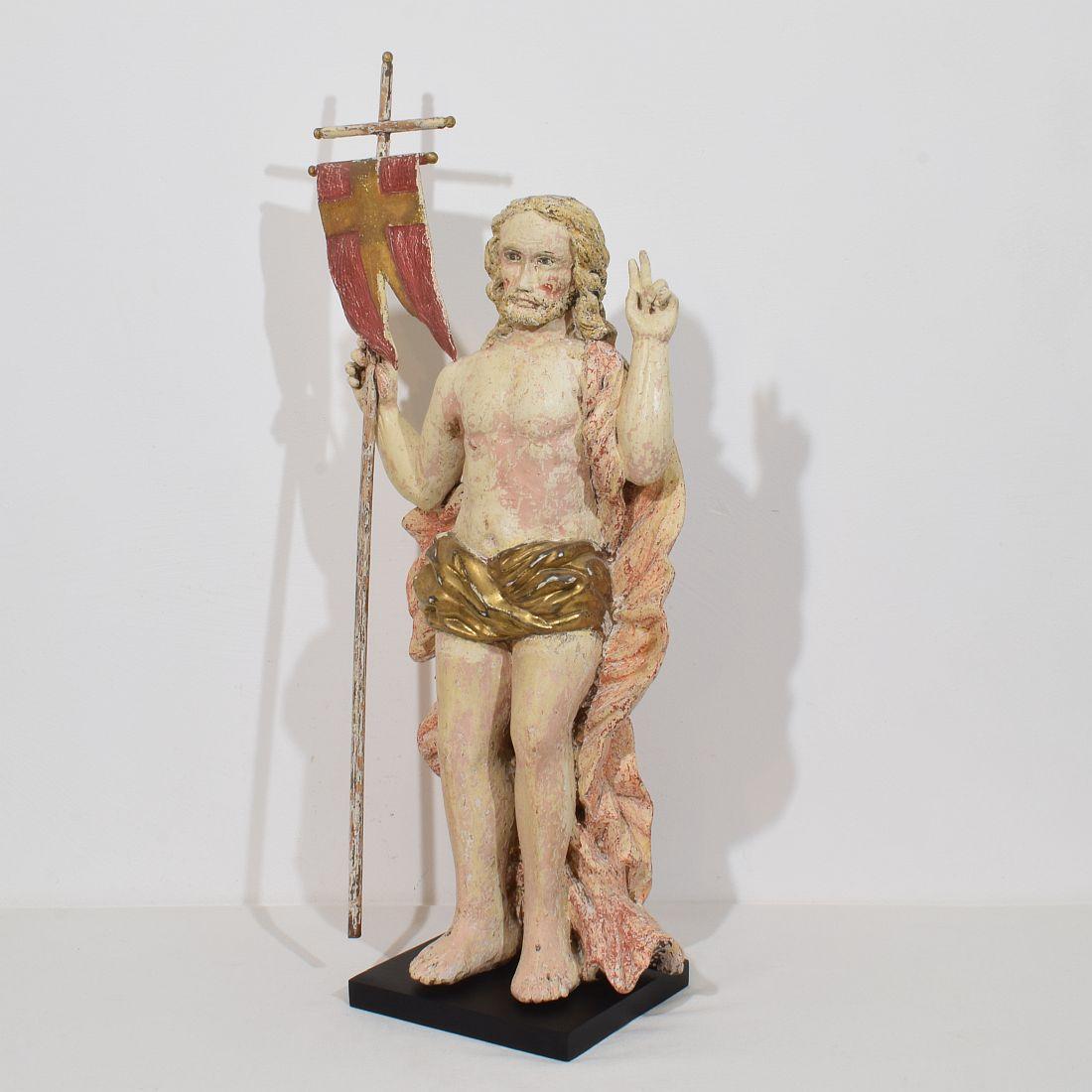 Beautiful hand carved wooden risen Christ/ resurrection statue with flag in folk-art style.
Great expression and traces of original color still visible.
France circa 1750.
Weathered, small losses and old repairs,
More photo's available on