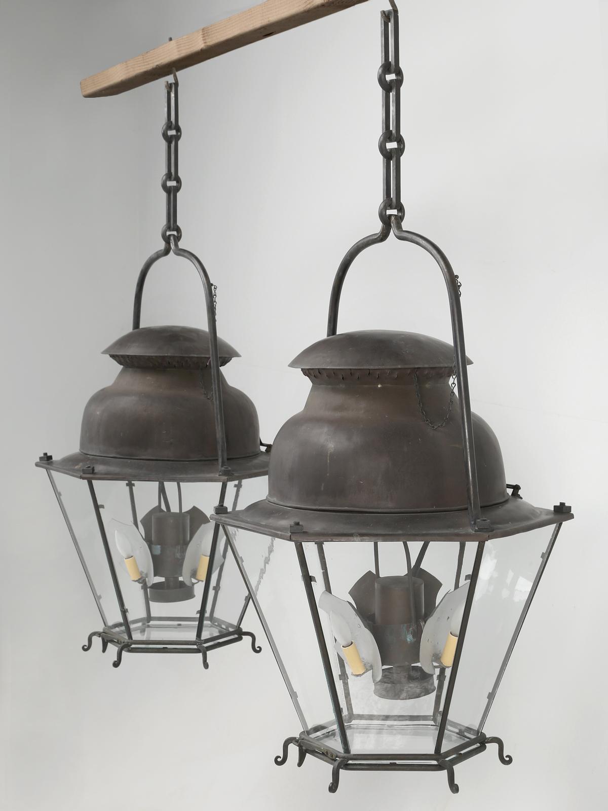 French 18th century style copper lanterns, recently handmade by one of our craftsmen in Chicago. The French inspired copper lanterns were fabricated utilizing a set of blueprints from the Historical Division of the French Government. This particular