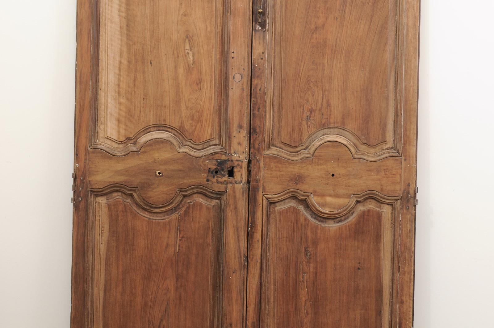 French 18th Century Tall Carved Walnut Double Doors with Molded Panels In Good Condition In Atlanta, GA