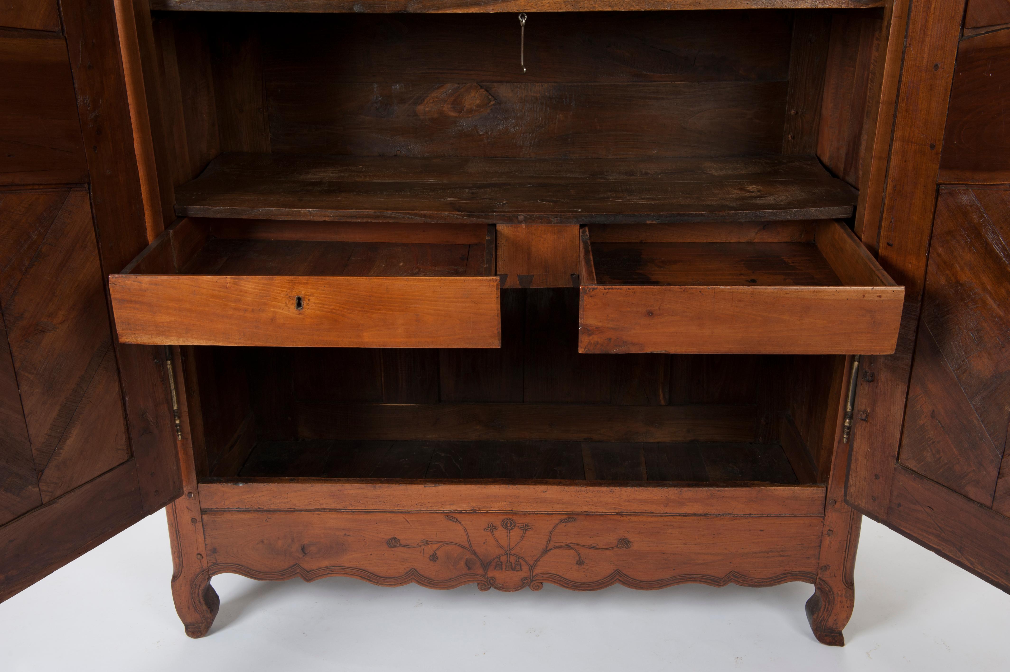 Hand-Carved French 18th Century Transition Cherrywood Armoire Cupboard, circa 1760 For Sale