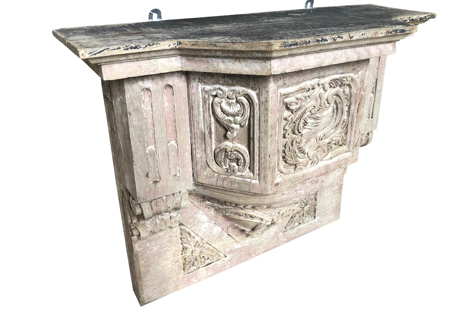 A stunning 18th century French wall suspended console. Beautifully crafted from oak with wonderful carving detail. Consoles such as this one were originally used for the display of statuary.