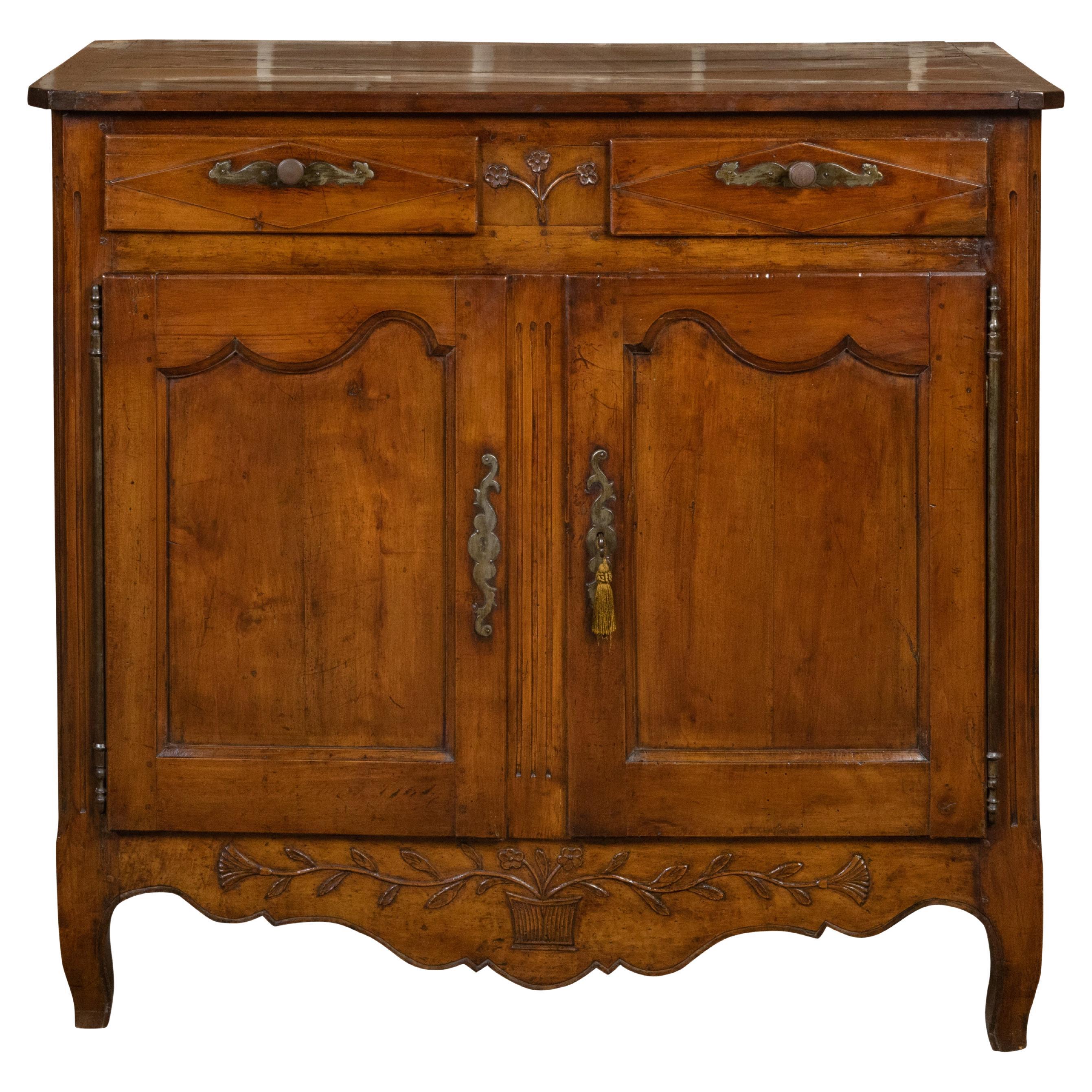 French 18th Century Walnut Buffet with Carved Floral Motifs, Drawers and Doors