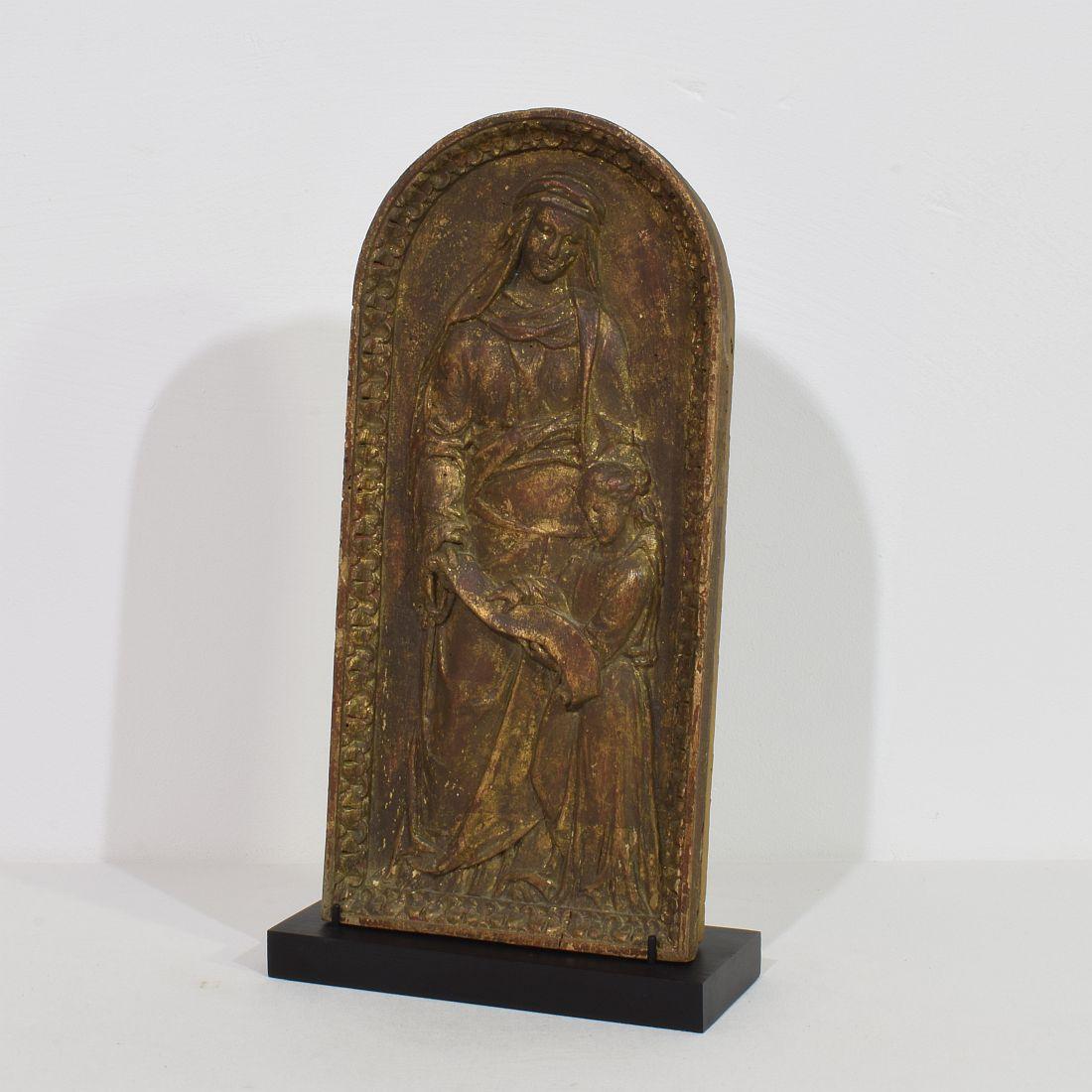 Lovely hand-carved wooden panel representing the teaching of Maria by mother Ann.
Most likely it once was a door of a tabernacle. Beautiful weathered.
France circa 1750
Measurements include the wooden base.