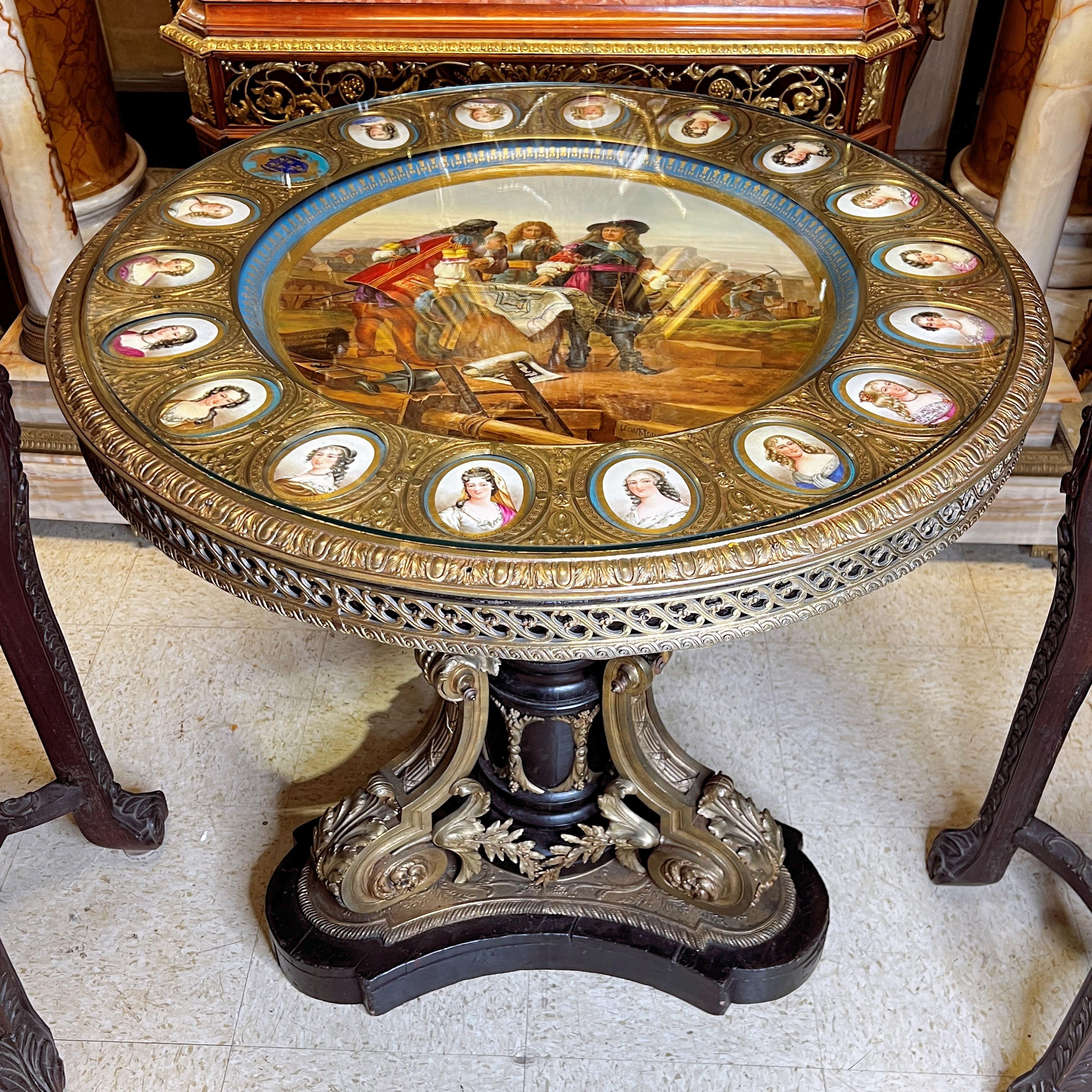 Finest quality French 19 century Louis XVI Style gilt Bronze and Serves Porcelain Center Table with large porcelain plaque depicting the architect to Louis XVI plus the porcelain portrait medallions of female members of the court.