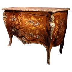 Commode française de style Louis XVI du 19ème siècle en marqueterie et bronze doré incrusté 