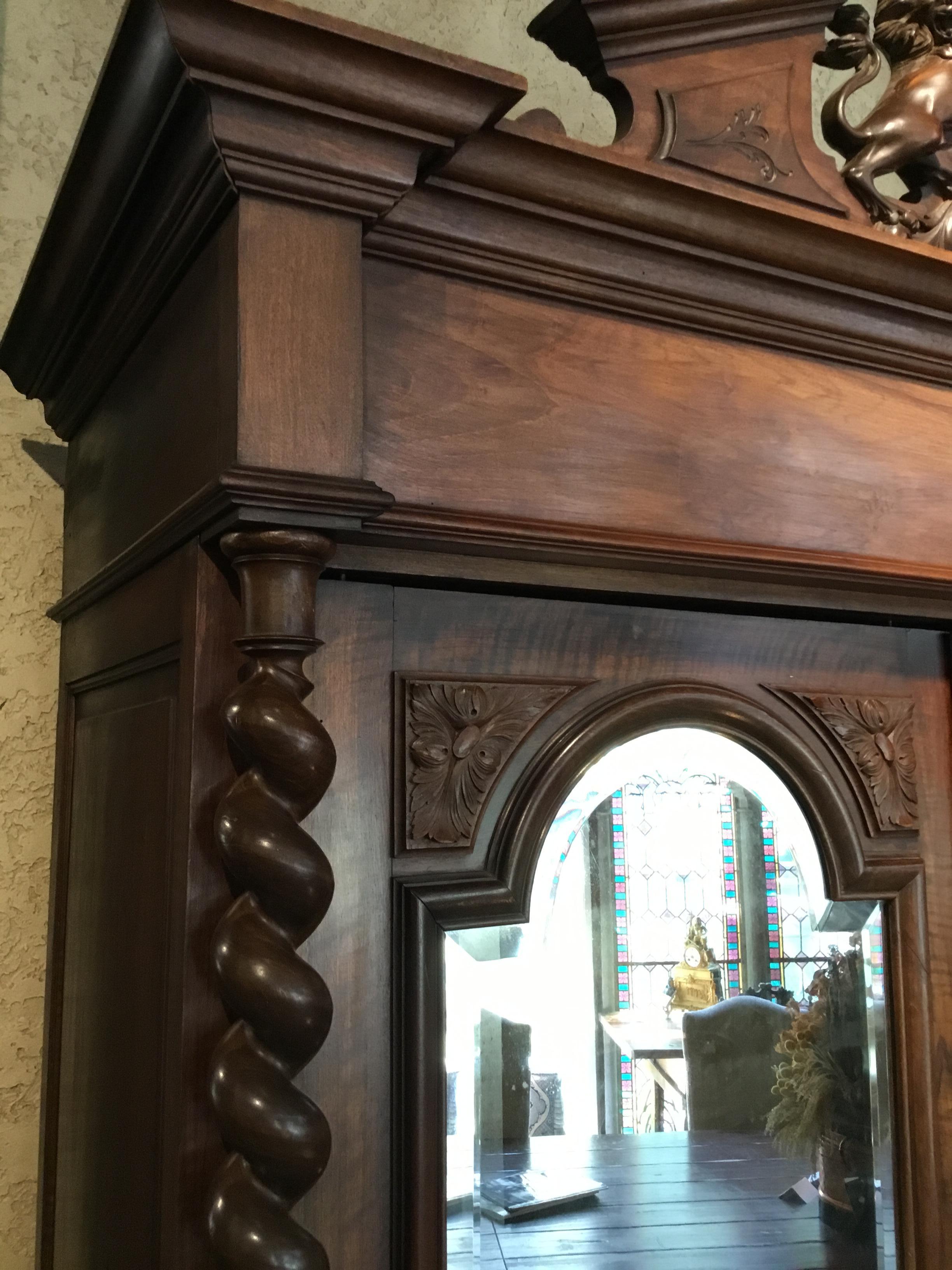 French 19th Century Armoire in Walnut with Carved Lion Crest In Good Condition In Houston, TX