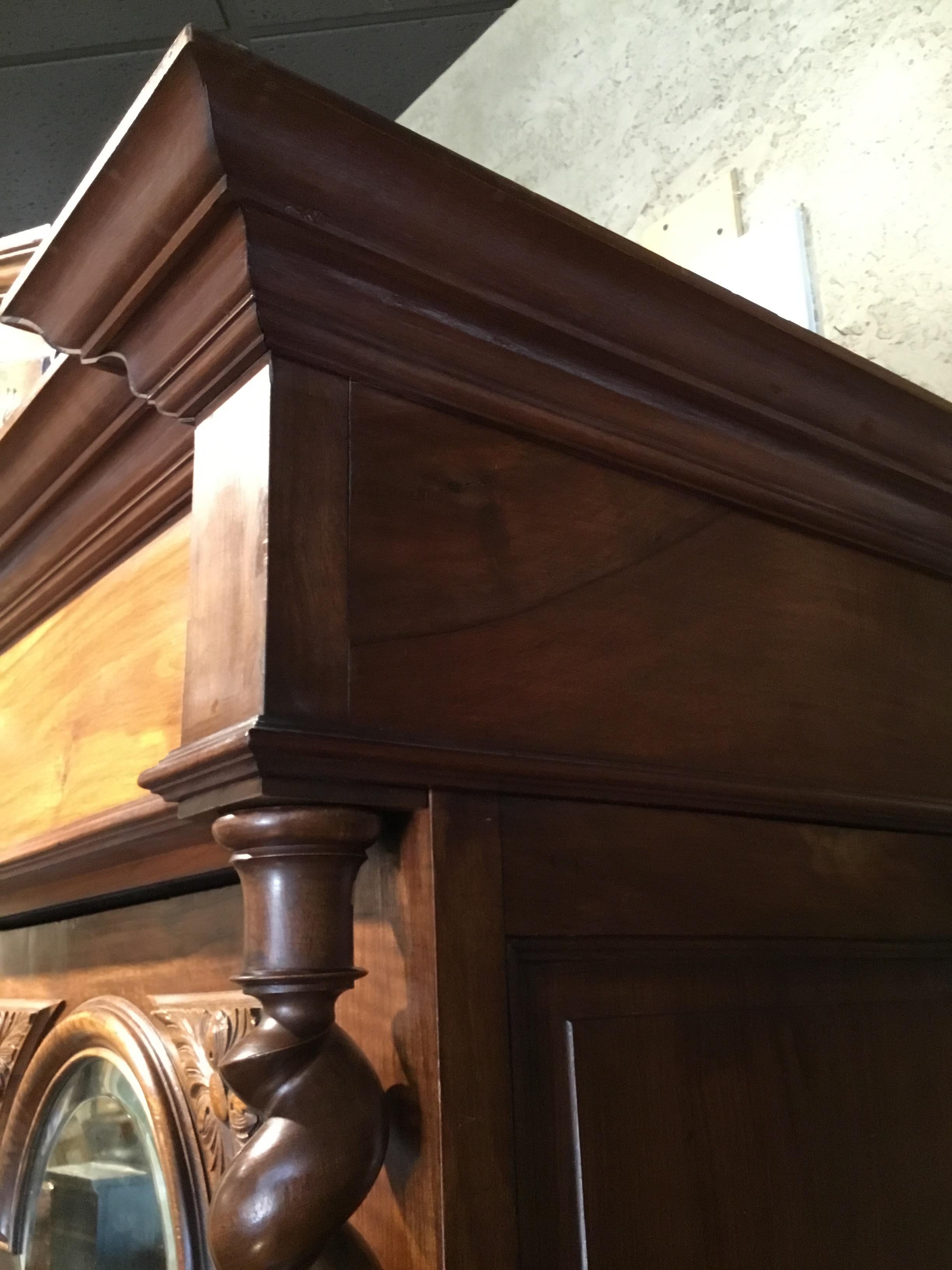 French 19th Century Armoire in Walnut with Carved Lion Crest 1