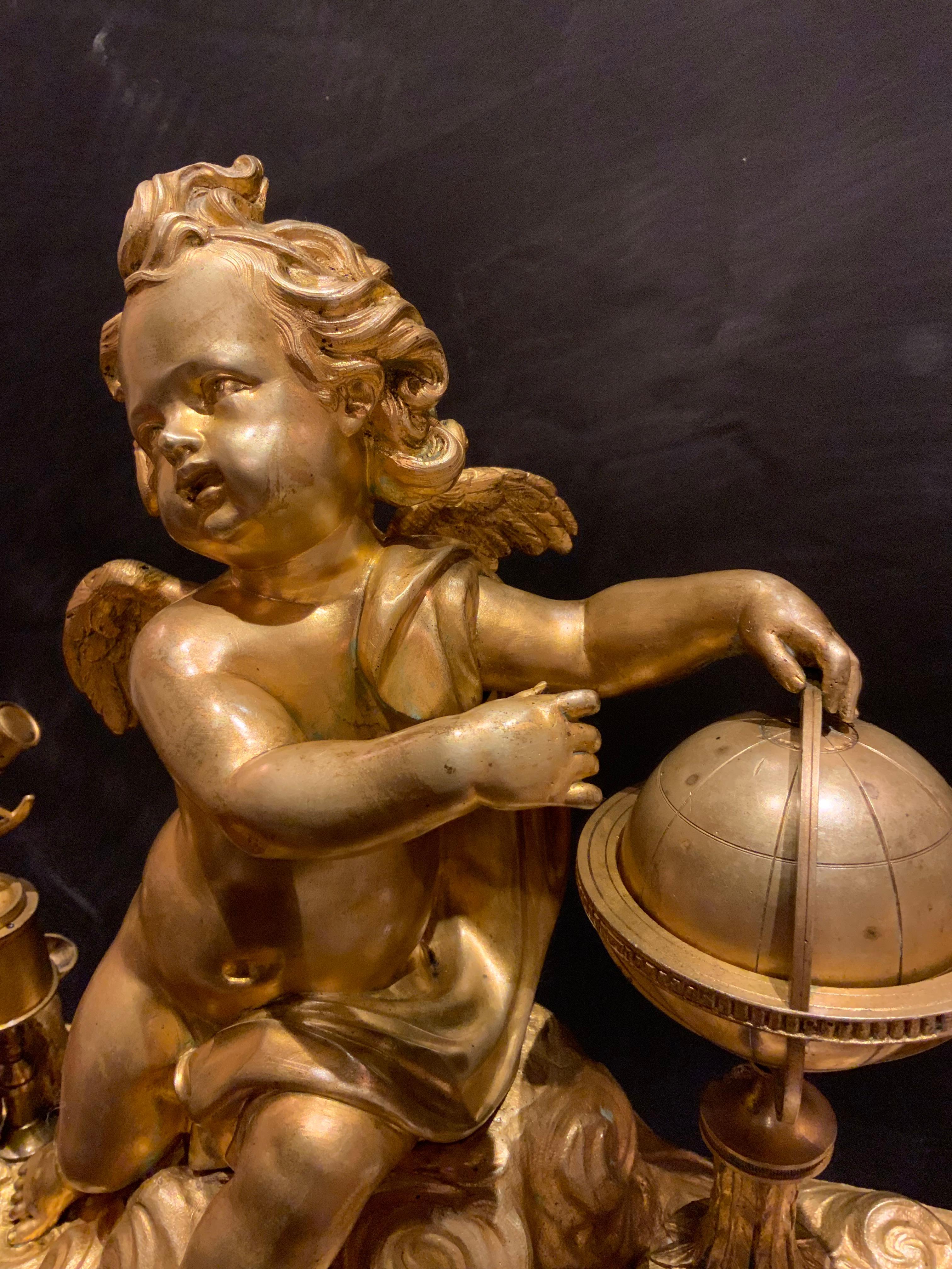 This clock was made in France during the period when science and
Astrology were being explored and brought to the attention of the
Populace. The putto that sits at the upper portion is holding the globe
Of the world and to the left is his telescope.
