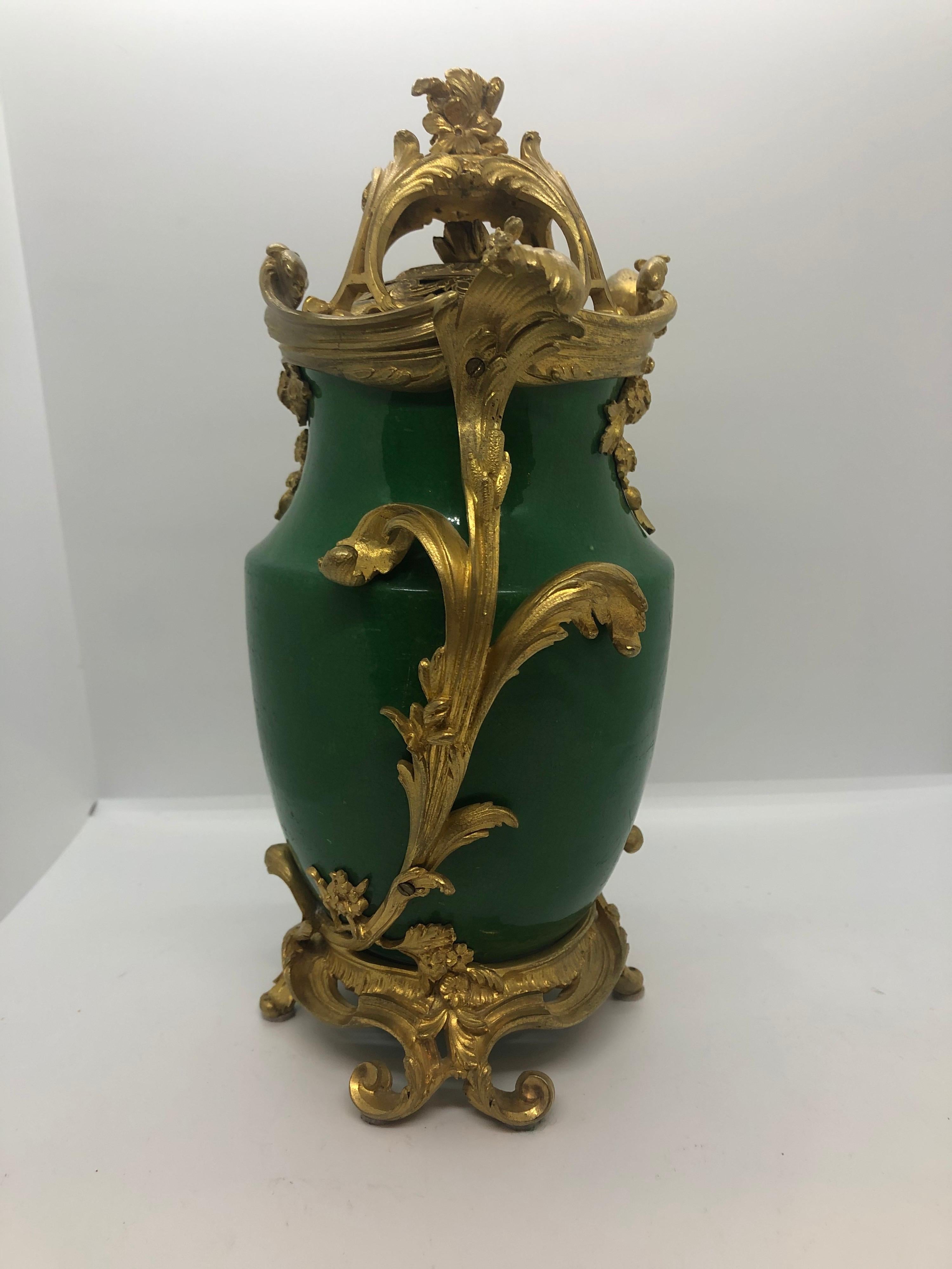 French apple green porcelain and gilt bronze mounted parfumerie in the Louis XV taste.