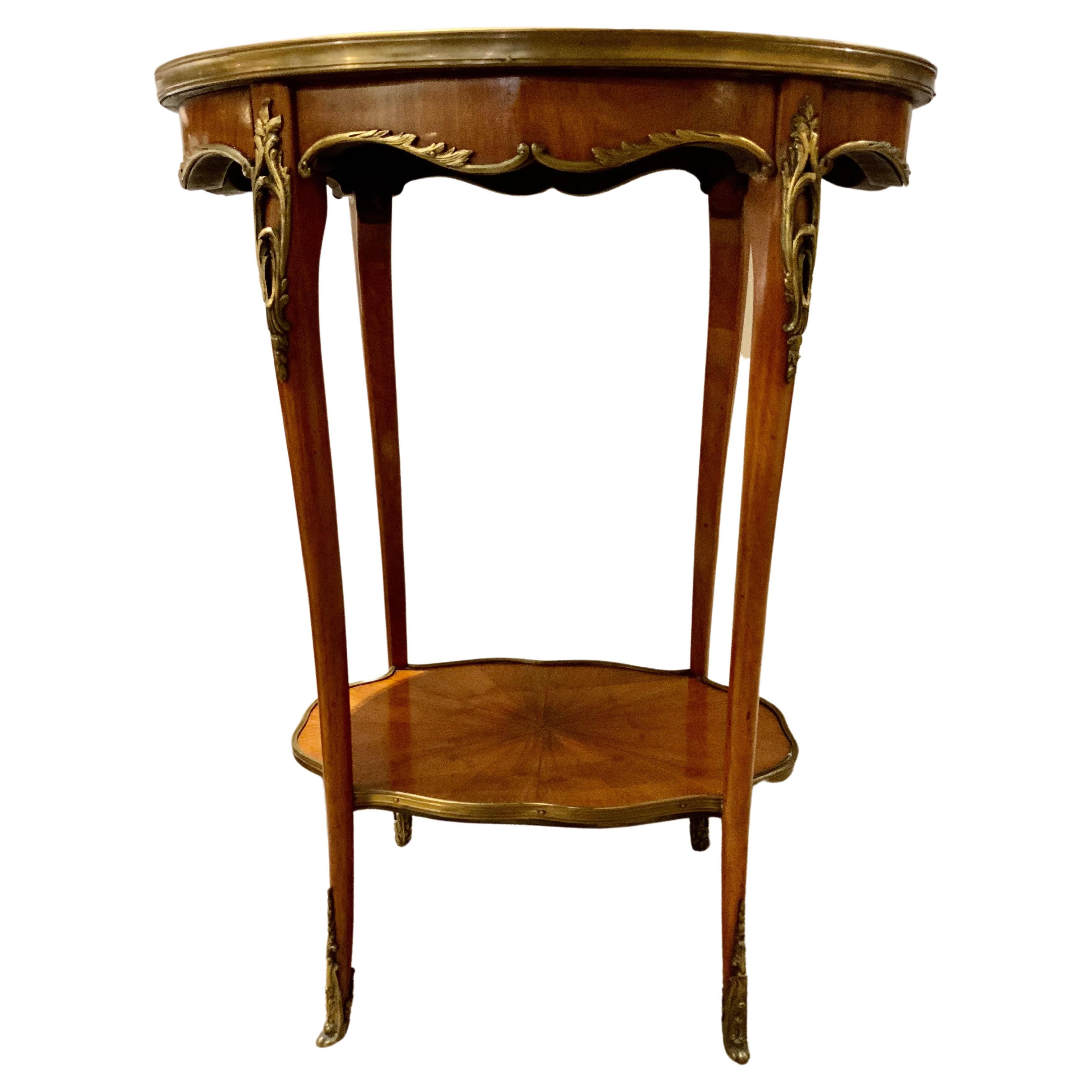French 19 Th Century Oval Shaped Side Table with Ormolu Banding and Designs For Sale