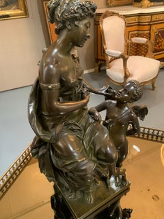 Sculpture française du 19ème siècle représentant Cupidon et une femme classique par Louis Demaille
