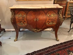 French 19 th walnut commode with interior drawers, blush marble top