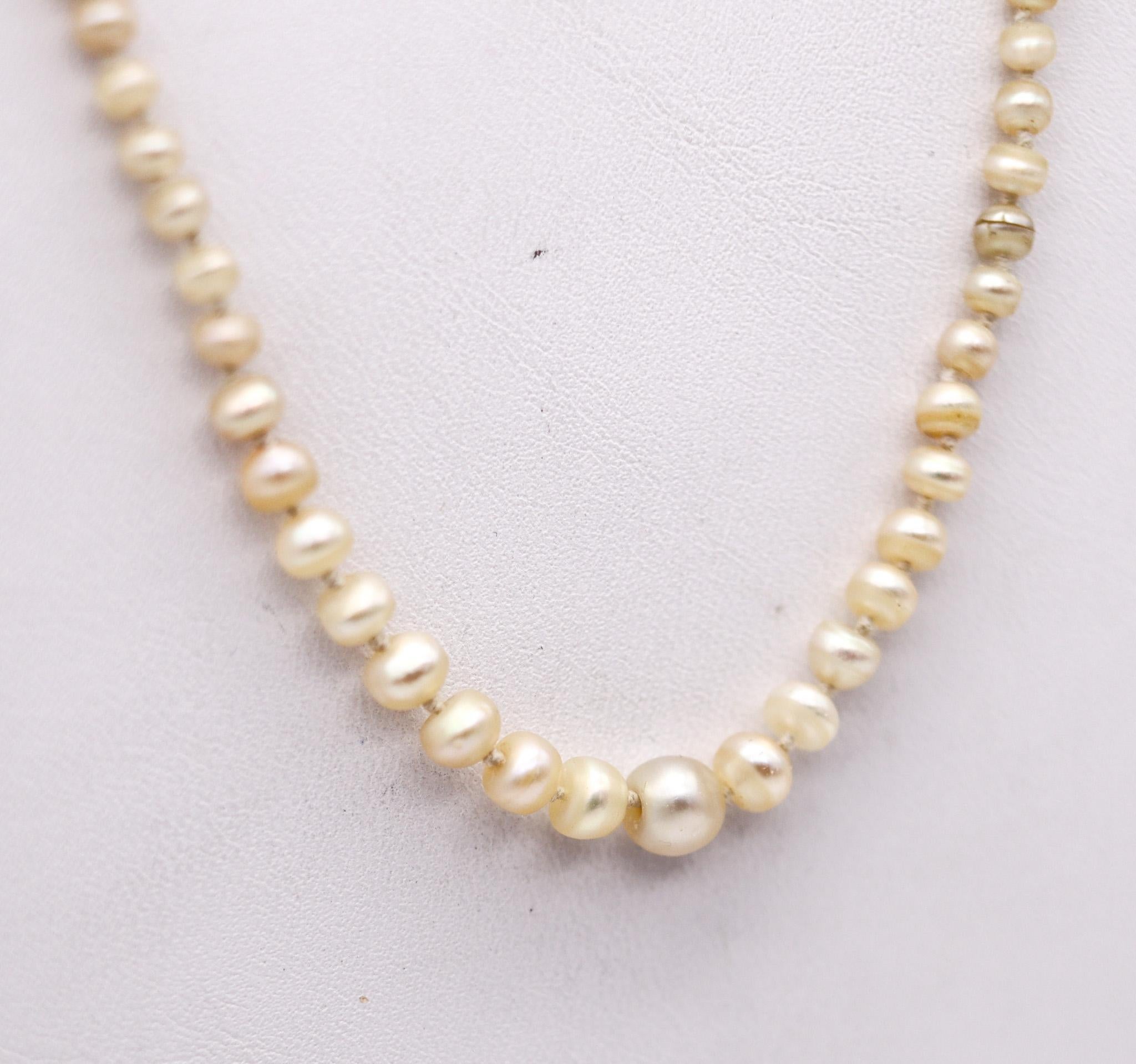 Edwardian belle époque pearls necklace.

Beautiful and very delicate necklace, created in England during the Edwardian belle époque period, back in the 1910. This necklace is made up by a knotted strand of one hundred twenty pearls and a round