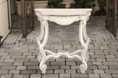 Table console peinte de style rococo français de 1900 avec pieds à volutes et traverse