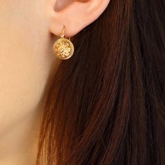 Boucles d'oreilles françaises des années 1900 en or rose 18 carats, avec fermoir à levier et motif floral