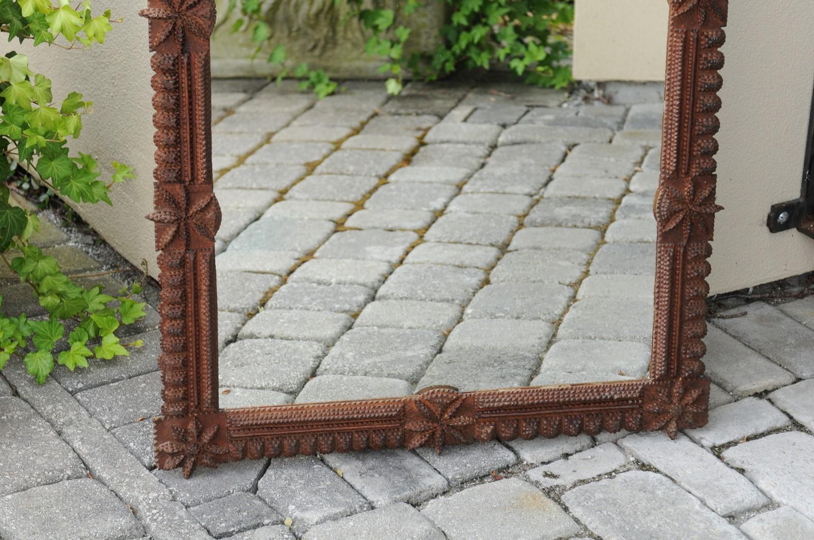 20th Century French 1900s Carved Tramp Art Mirror with Star Motifs and Protruding Corners