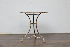 French 1900s Cast Iron Bistro Table with Claw Feet and Distressed Painted Finish
