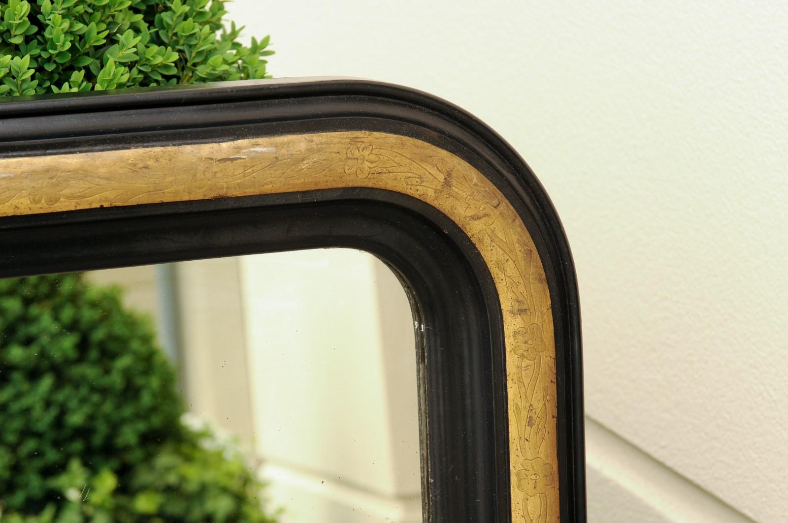 20th Century French 1900s Louis-Philippe Style Mirror with Ebonized Frame and Gilt Accents