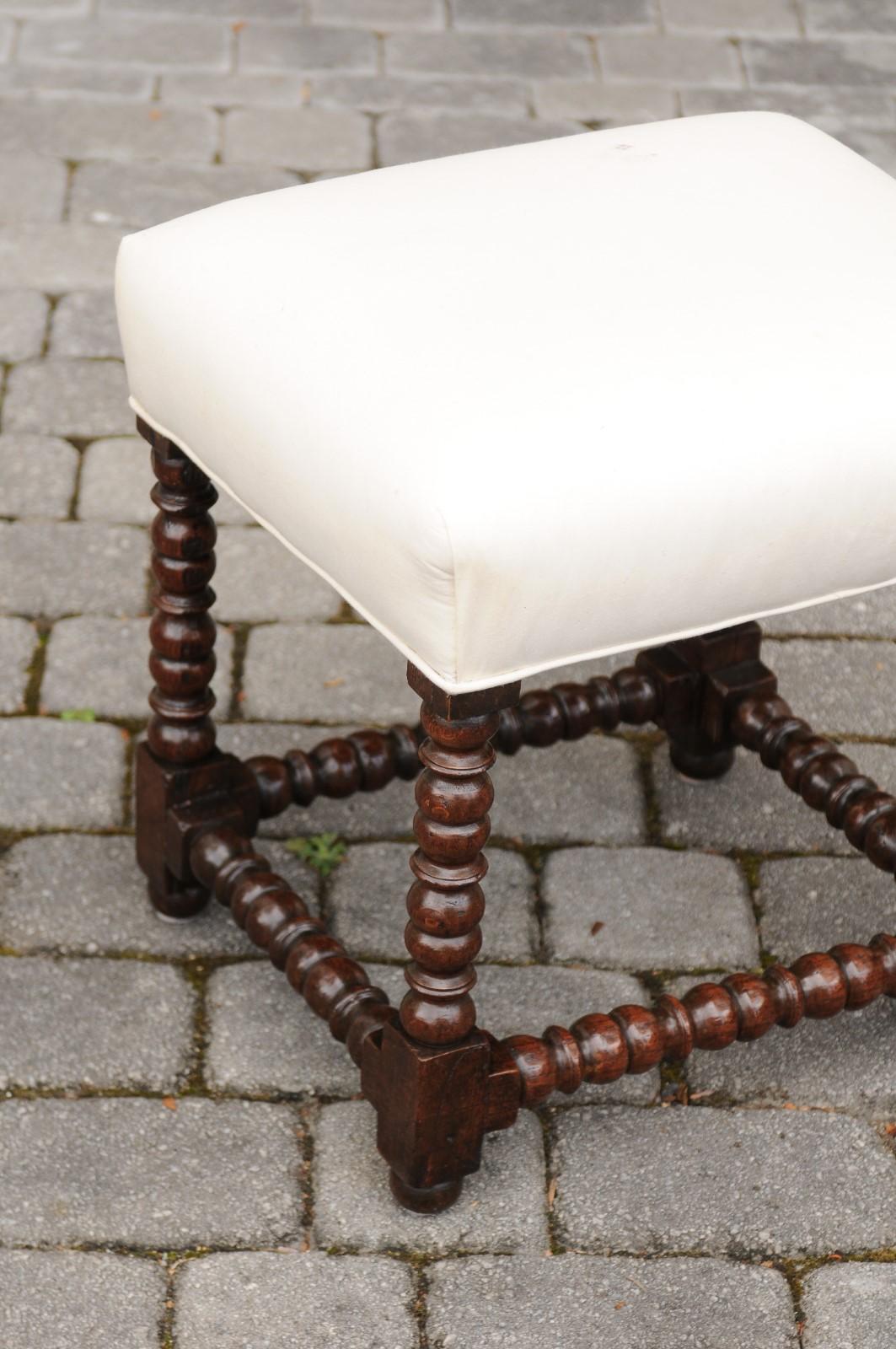 French 1900s Louis XIII Style Oak Stool with Bobbin Legs and New Upholstery In Good Condition In Atlanta, GA