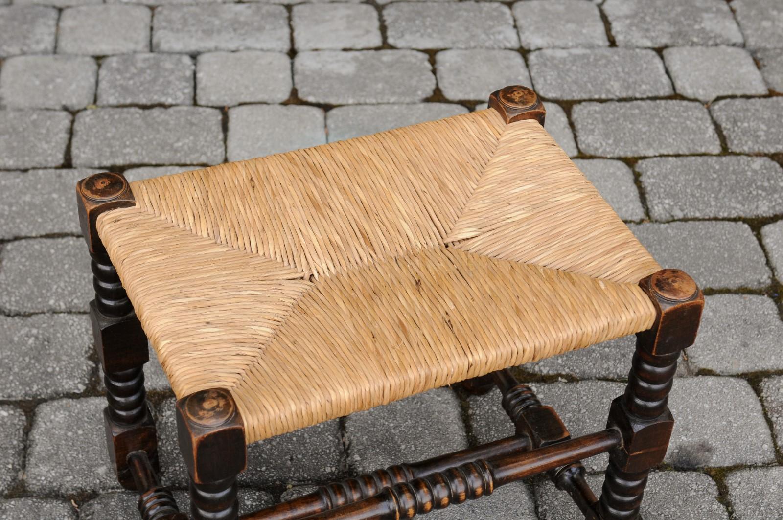 French 1900s Oak Stool with Turned Bobbin Legs, Rush Seat and H-Form Stretcher In Good Condition In Atlanta, GA