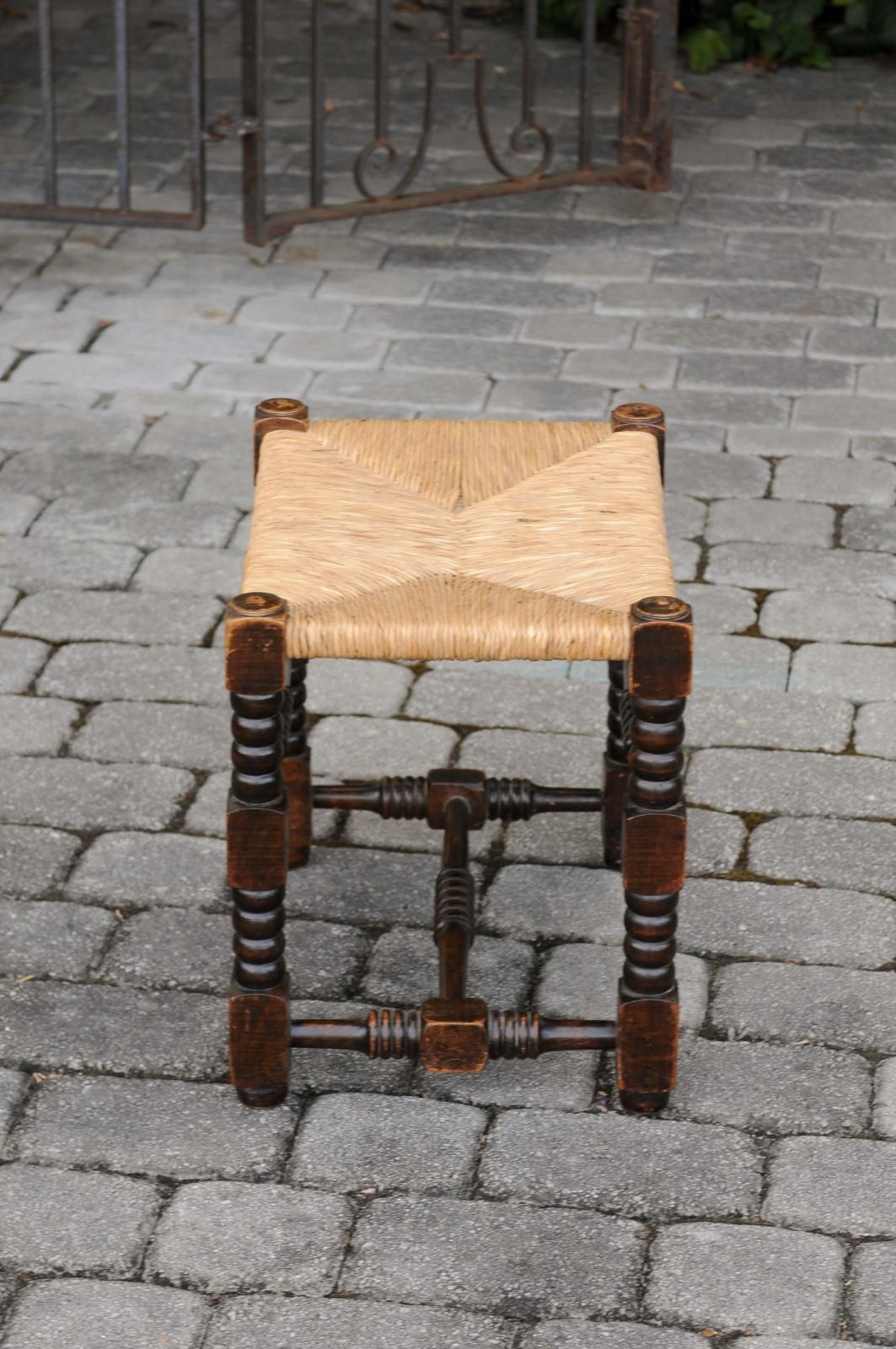 20th Century French 1900s Oak Stool with Turned Bobbin Legs, Rush Seat and H-Form Stretcher