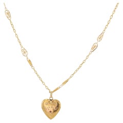 French 1900s Ruby 18 Karat Yellow Gold Heart Shape Pendant and Chain