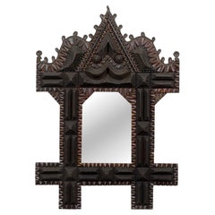French 1900s Tramp Art Mirror with Architectural Crest and Chip-Carved Frame
