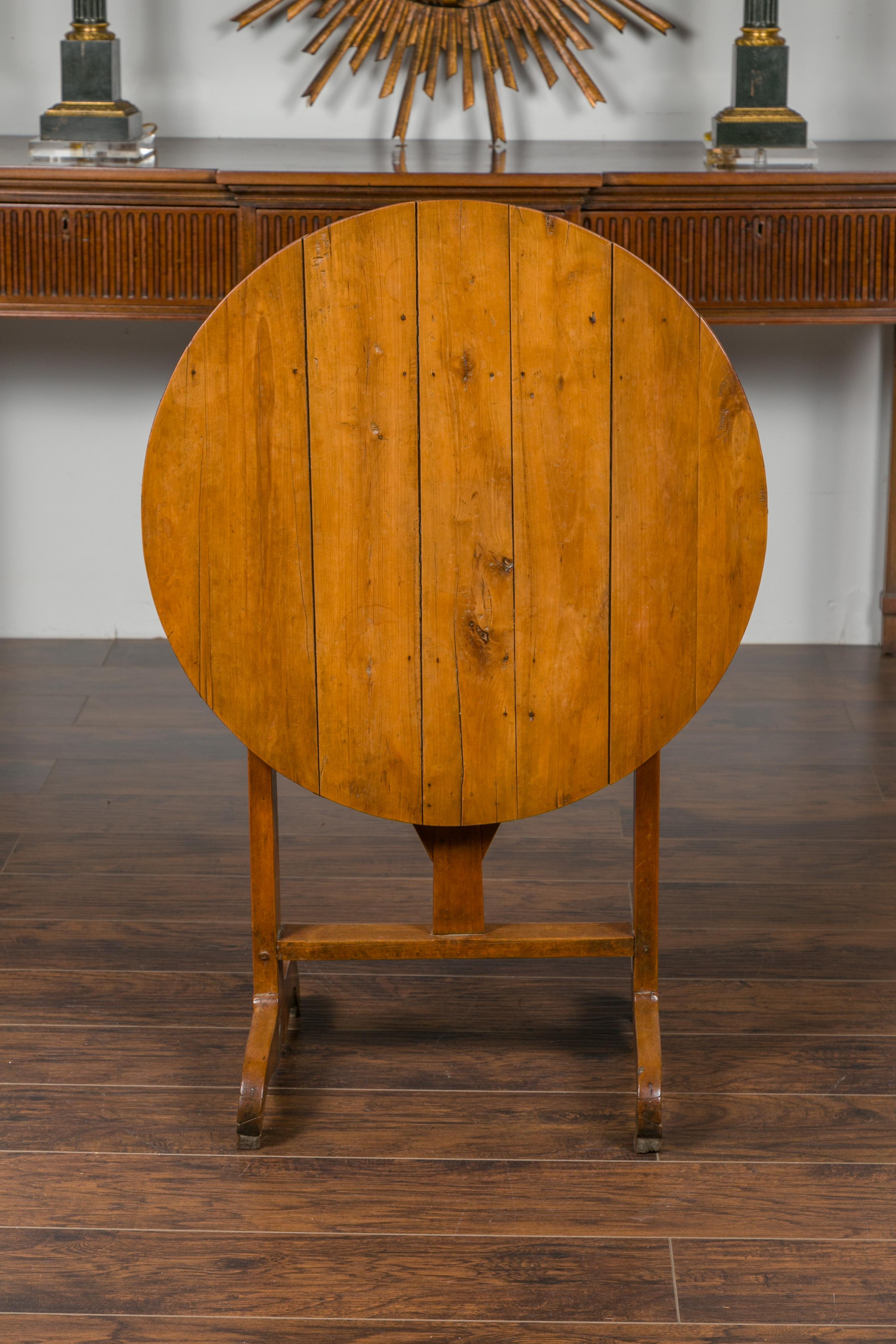 Rustic French 1900s Walnut Wine Tasting Table with Round Tilt-Top and Trestle Base
