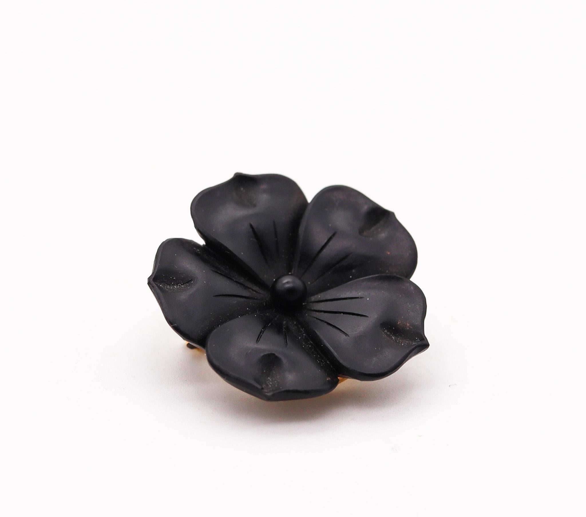 A French Edwardian art nouveau flower brooch.

Beautiful three-dimensional piece, created in Paris France during the Edwardian and the Art Nouveau periods, back in the 1900-1910. This beautiful  flower has been carefully carved from natural black