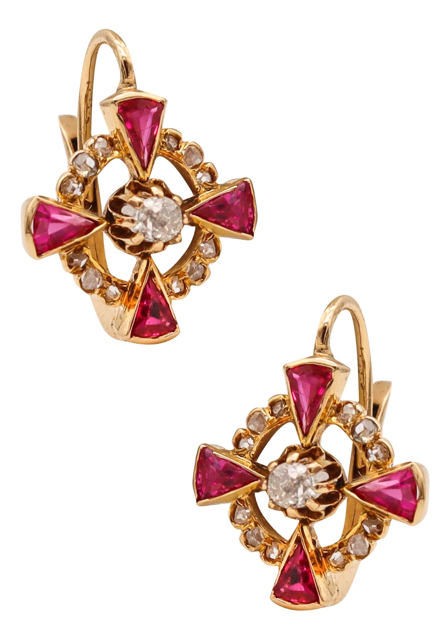 Edwardian belle epoque bow-brooch.

Very handsome pair from the Belle Epoque period, created during the Edwardian era (1901-1910), back in the 1905. This beautiful pair of dangle earrings has been carefully crafted in the shape of Maltese crosses in