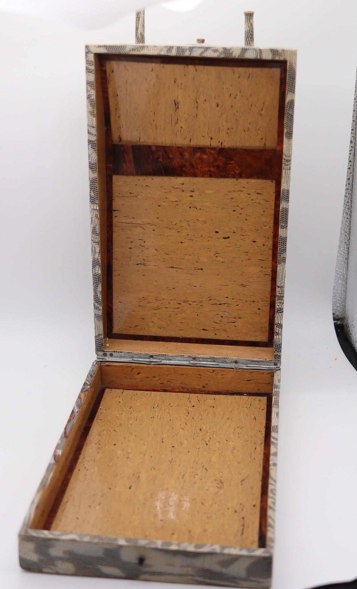 An art deco WWI Tank shaped desk cigar box humidor.

This is a fabulous and rare desk cigar box-humidor created in France during the art deco period, circa 1918. The amazing piece is very decorative and designed in the stylized shape of the French