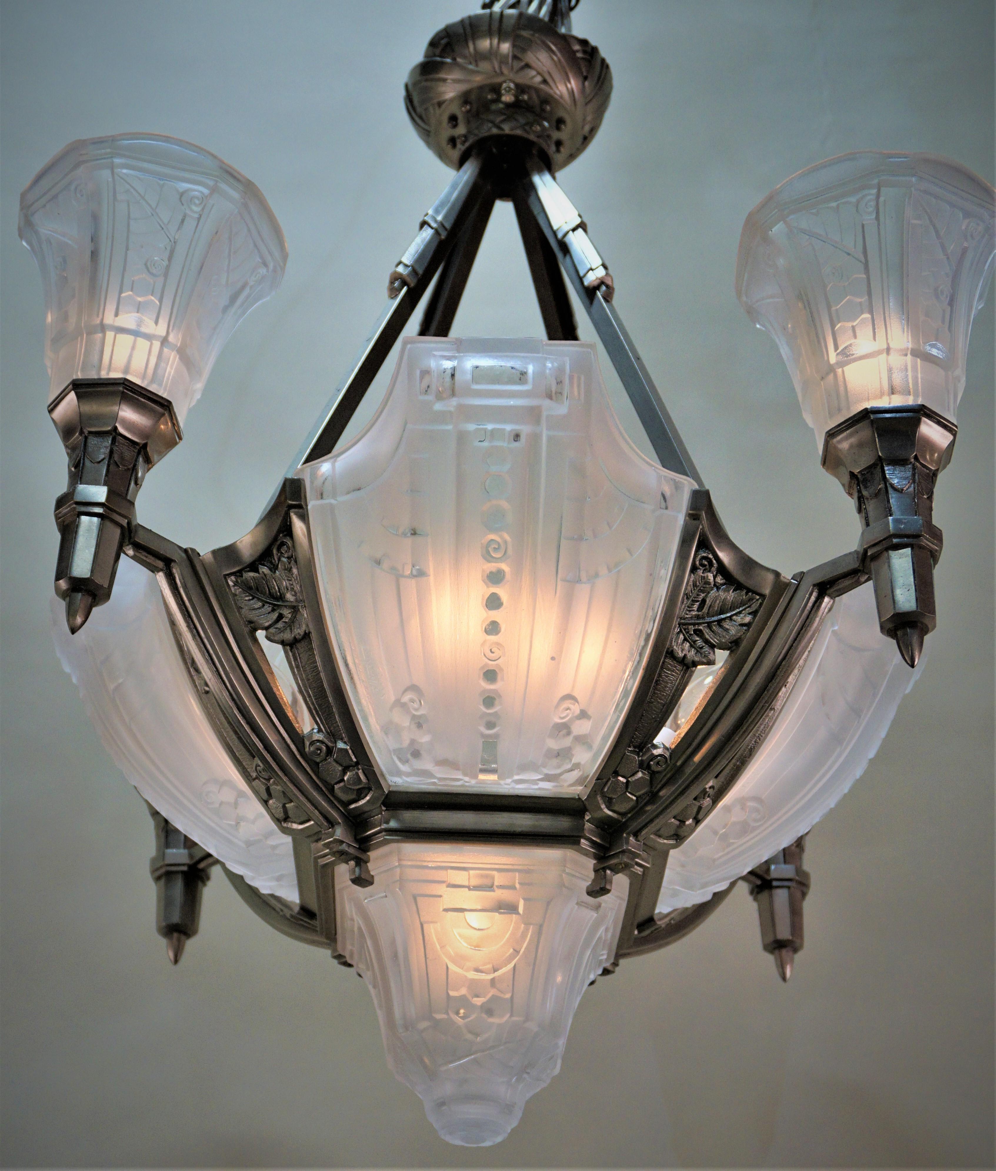 Very rare French Art Deco frosted glass chandelier with nickel on bronze frame.
26