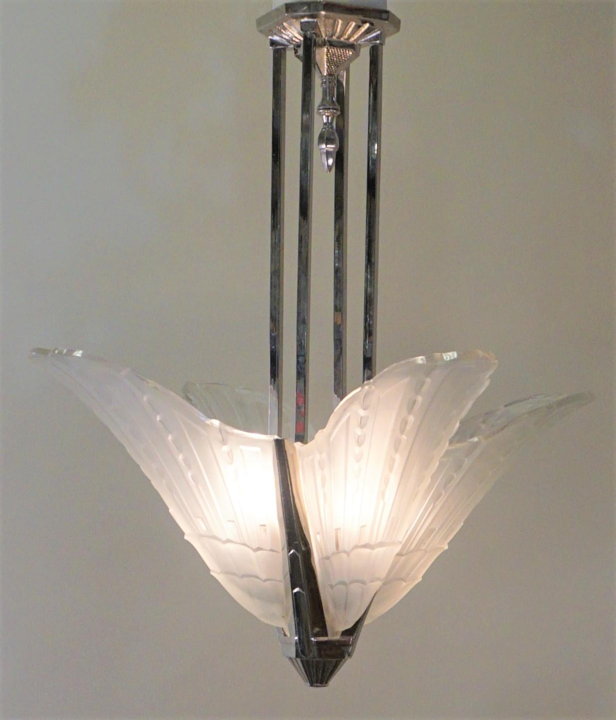 Elegant design, clear Frost glass shades with nickel on bronze frame Art Deco chandelier.