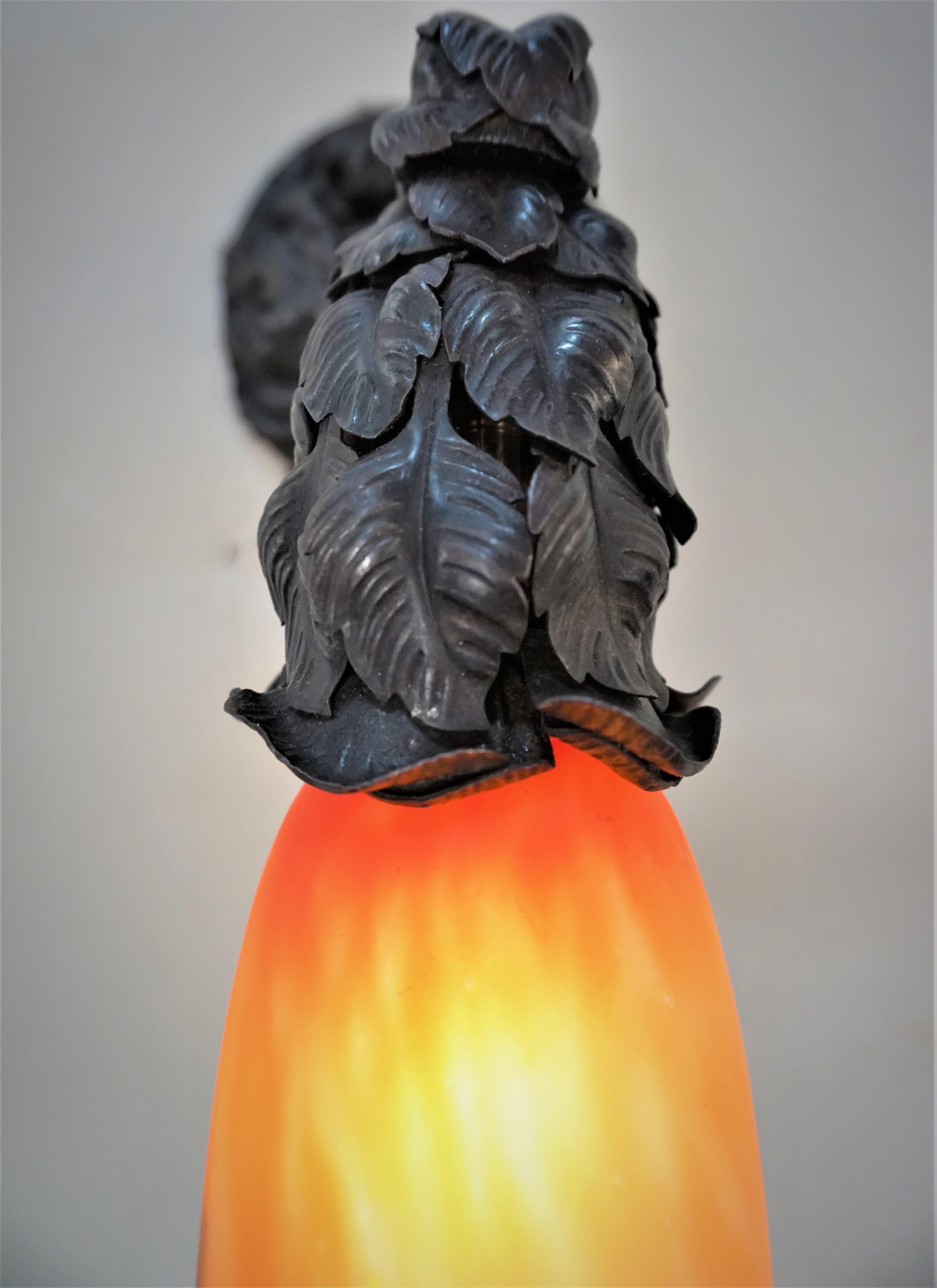 Early 20th Century French 1920s Art Glass and Iron Wall Sconce For Sale