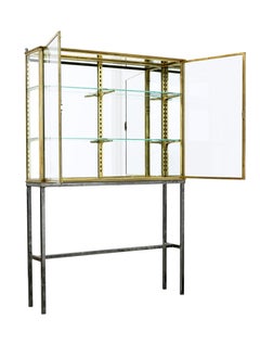 French 1920’s brass glazed shop display cabinet by Segel