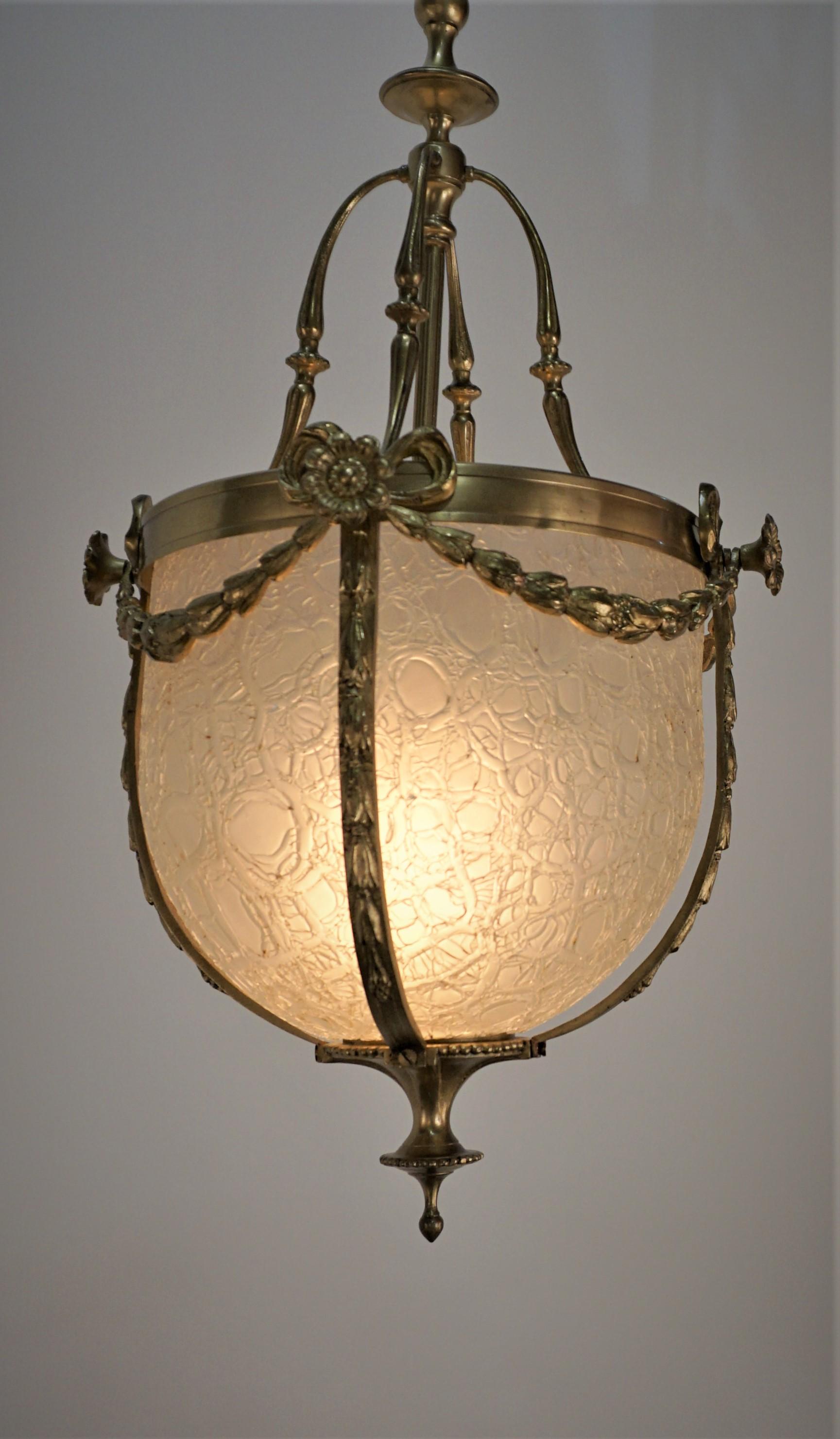 French 1920's bronze with texture crackle glass chandelier/lantern.
New wiring and ready for installation.