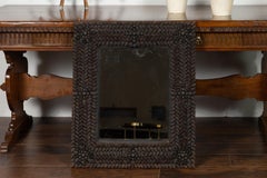 French 1920s Pinecone Mirror with Dark Patina and Floral Motifs