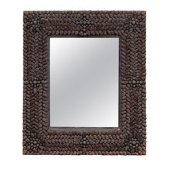 French 1920s Pinecone Mirror with Dark Patina and Floral Motifs