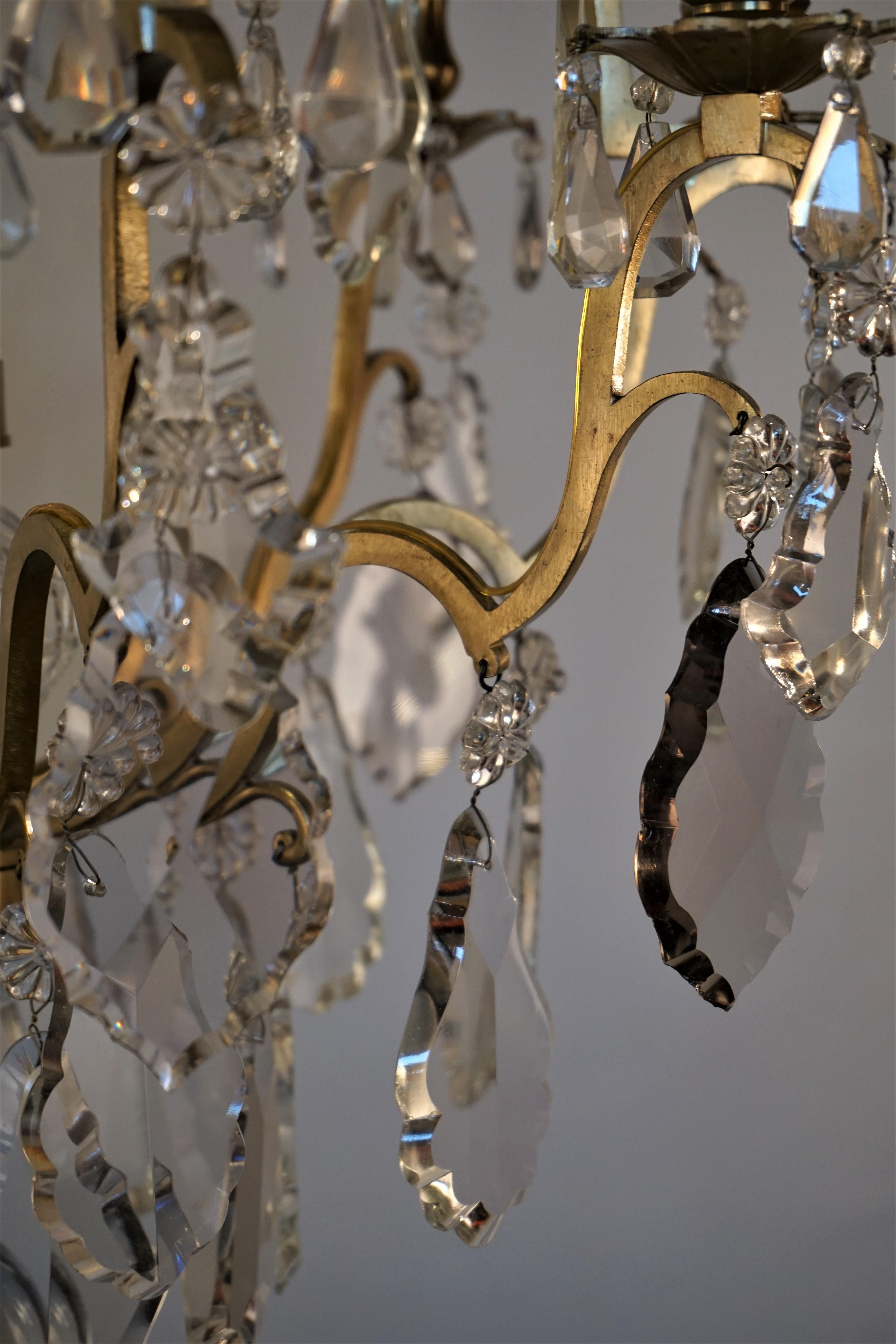 Early 20th Century French 1920s Crystal and Bronze Chandelier
