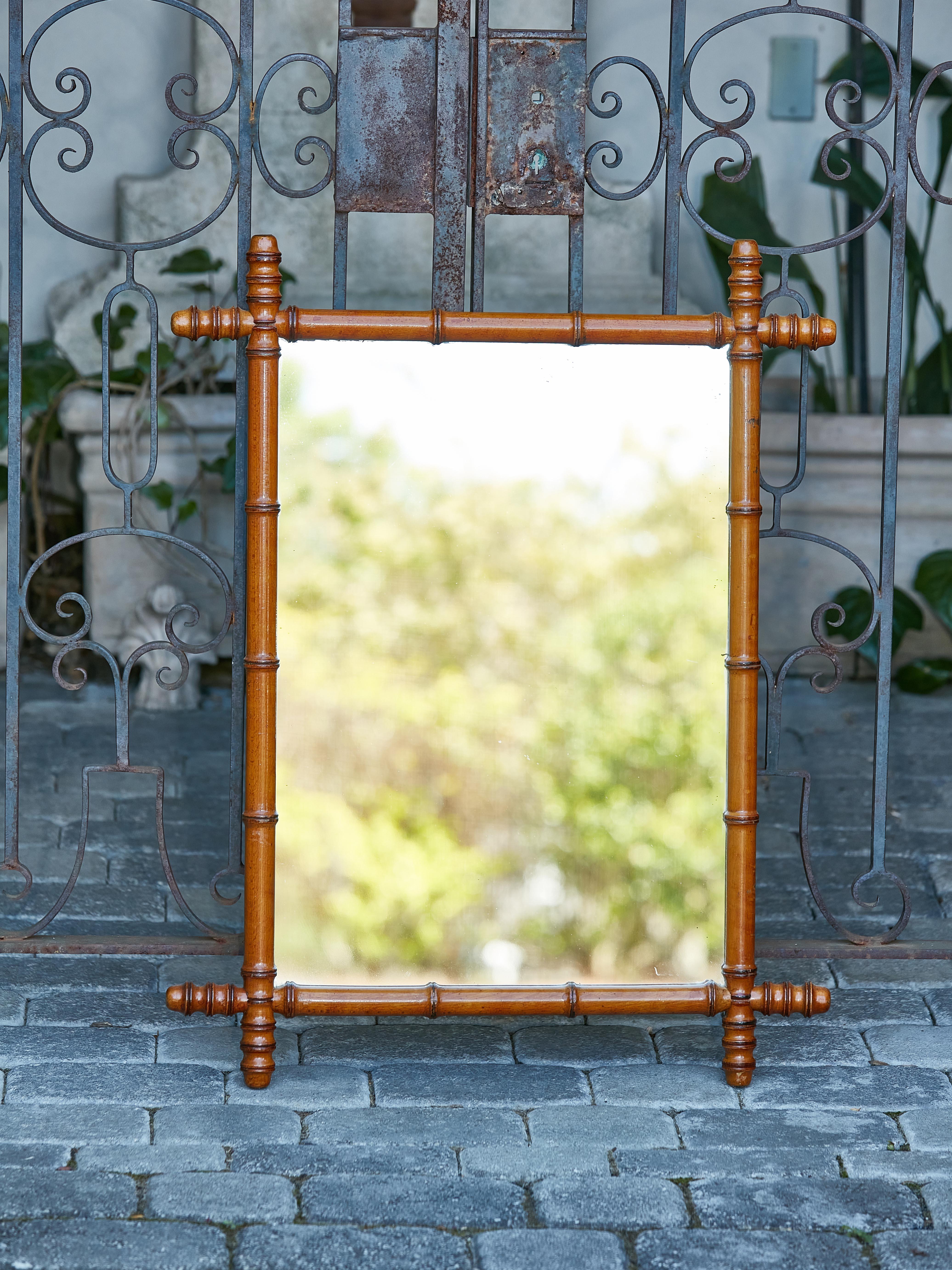 French 1920s Faux Bamboo Walnut Mirror with Protruding Corners and Brown Patina 4