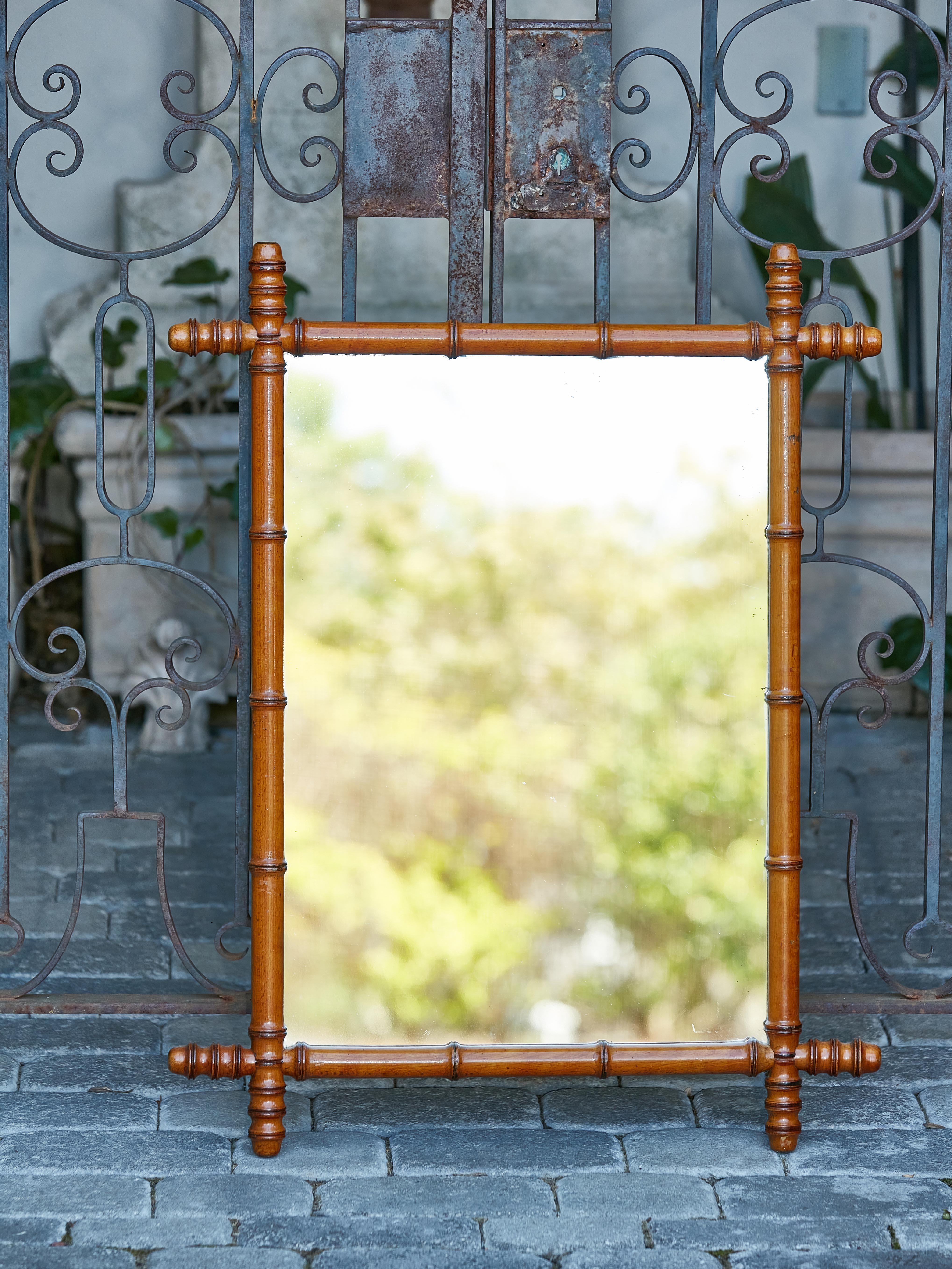 French 1920s Faux Bamboo Walnut Mirror with Protruding Corners and Brown Patina In Good Condition In Atlanta, GA