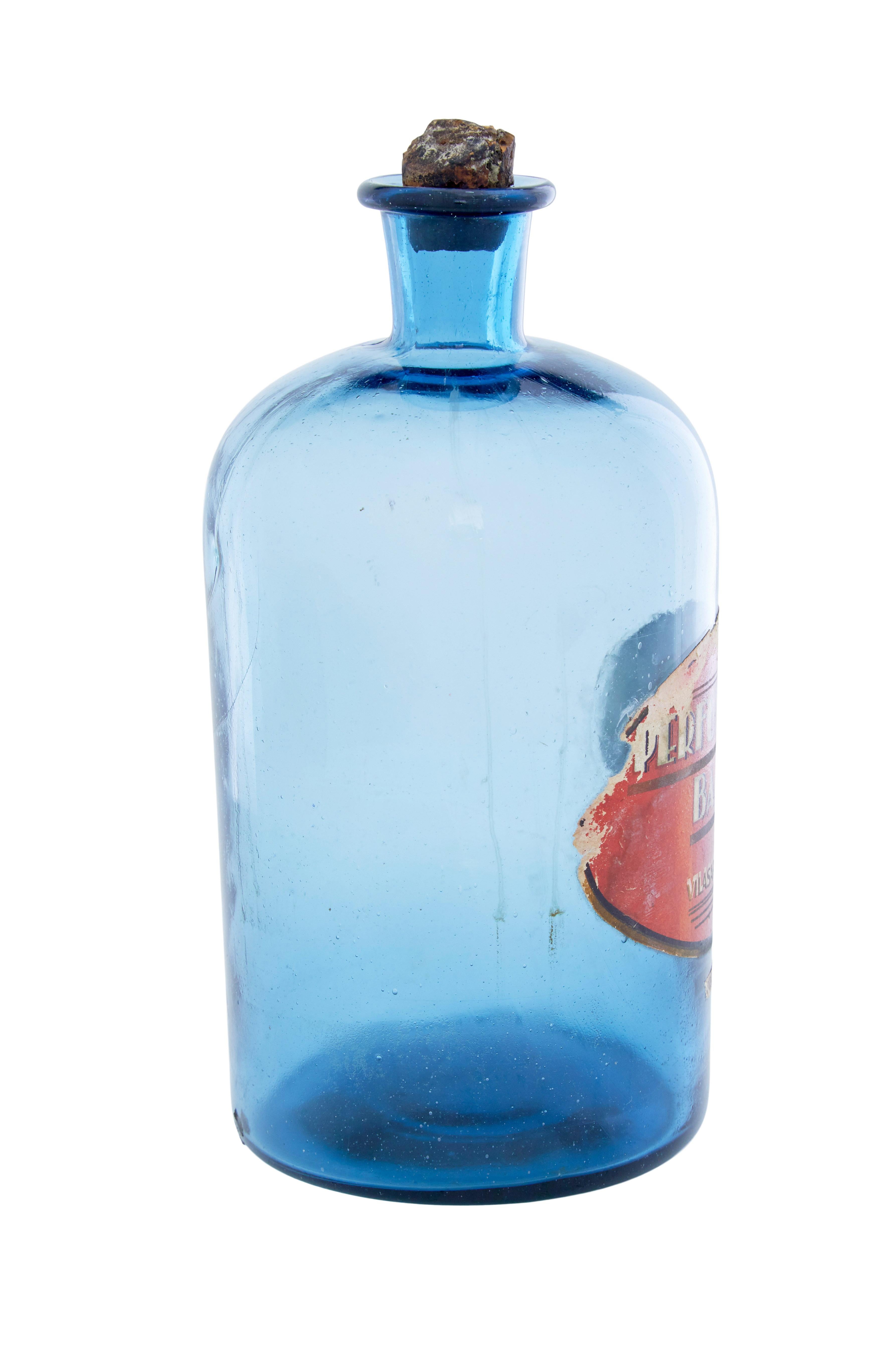 Glazed French 1920’s hand made glass blue perfume bottle For Sale