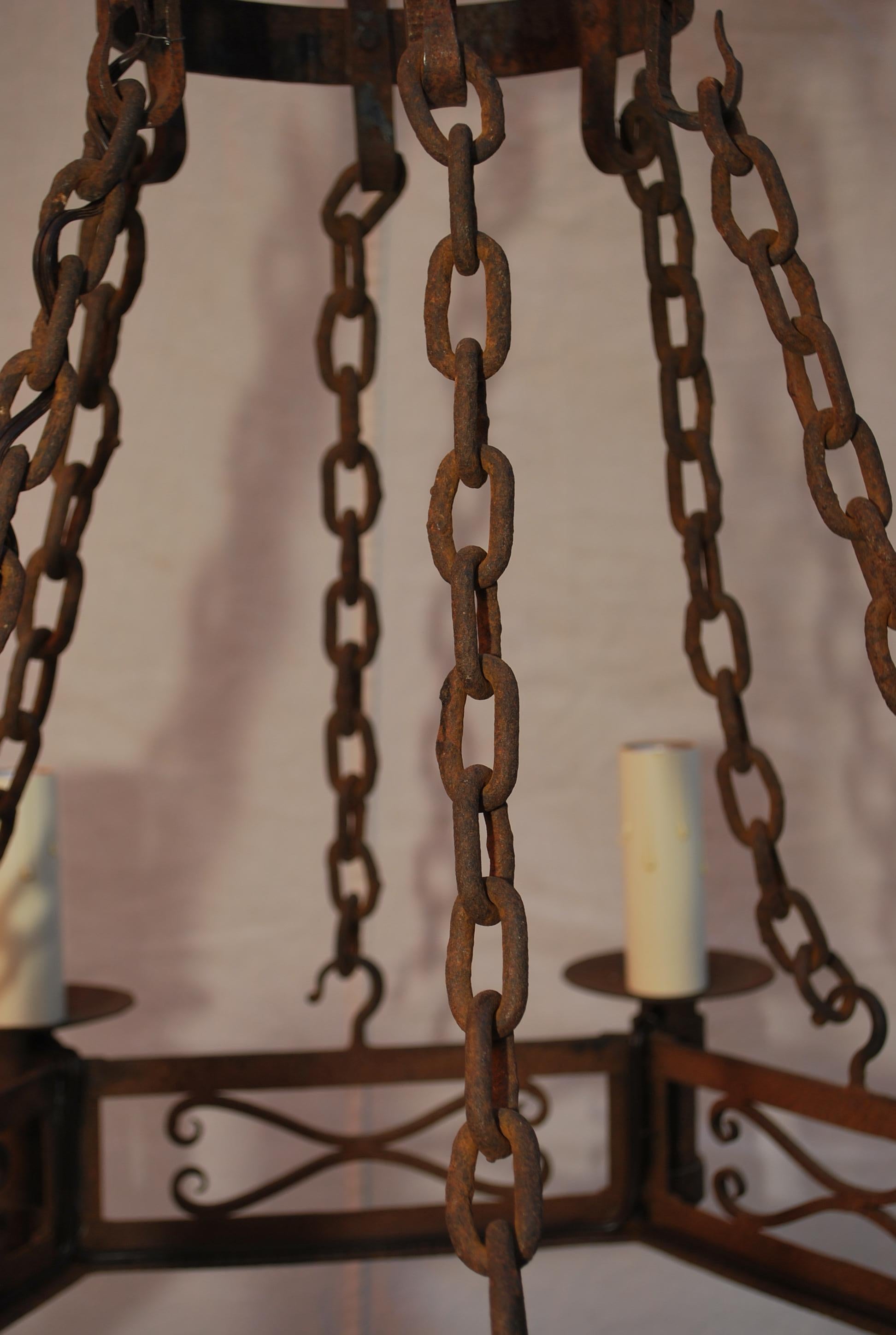 Early 20th Century French 1920's hands forged wrought iron chandelier For Sale
