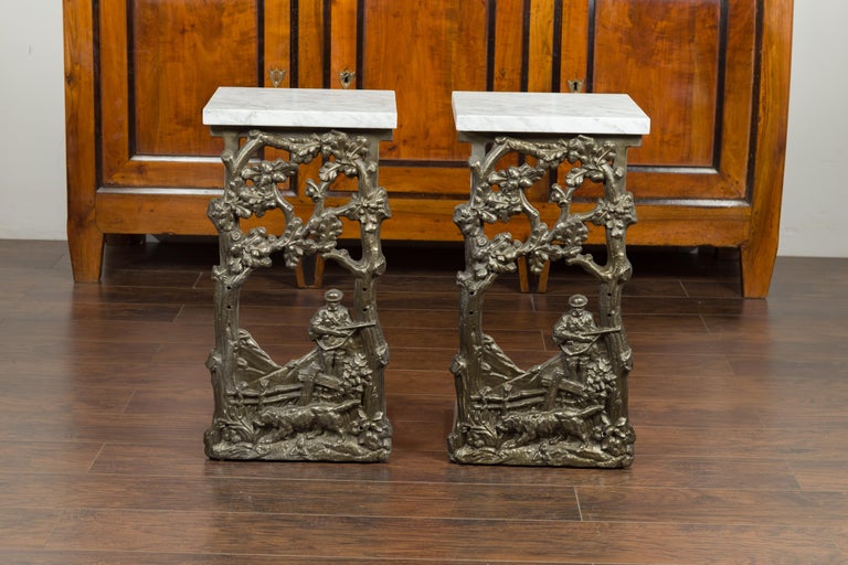 French 1920s Iron Fragment Depicting a Hunter Made into a Table with Marble Top In Good Condition For Sale In Atlanta, GA