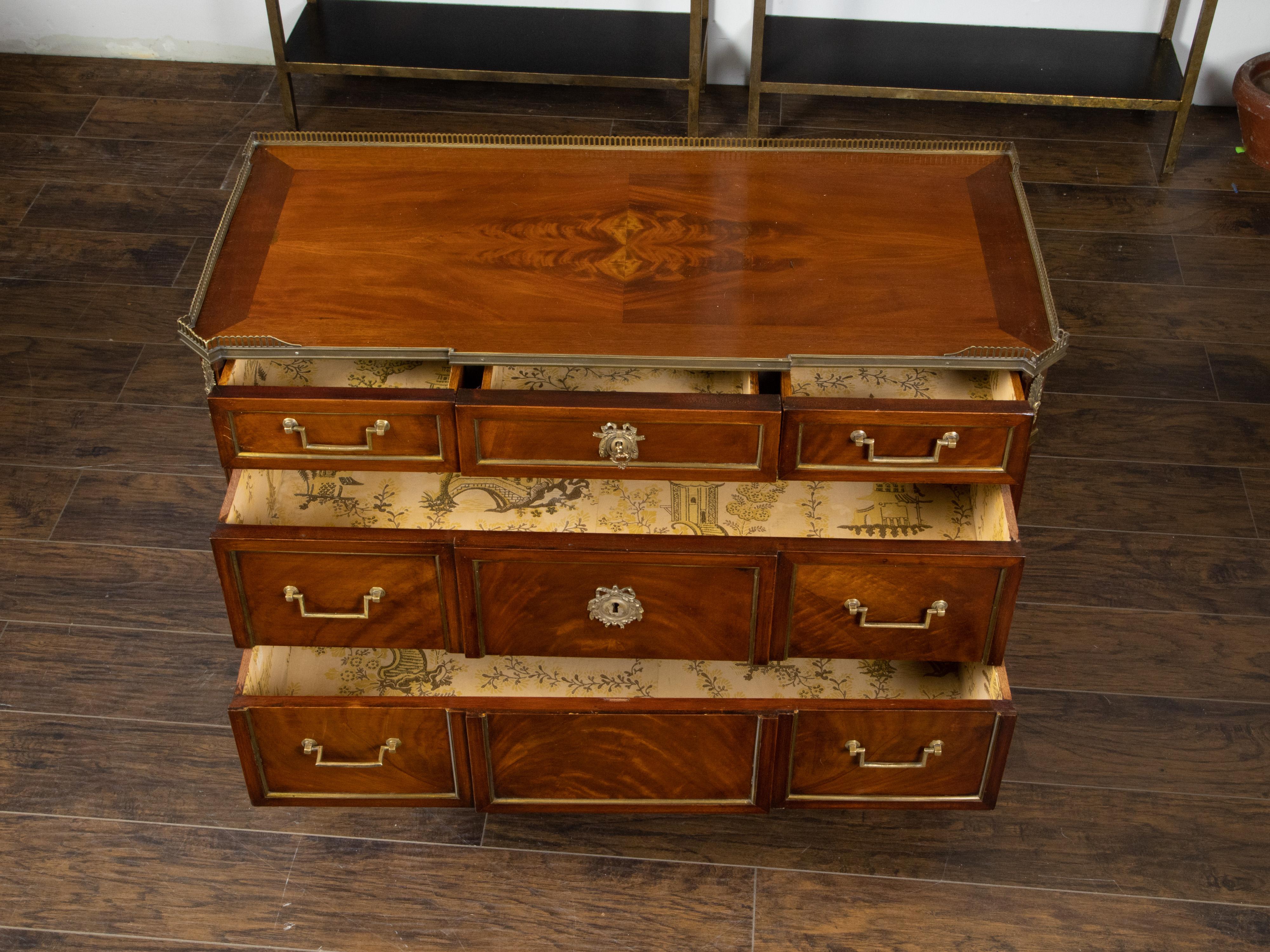20th Century French 1920s Mahogany Five-Drawer Commode with Bronze Mounts and Fluted Motifs For Sale