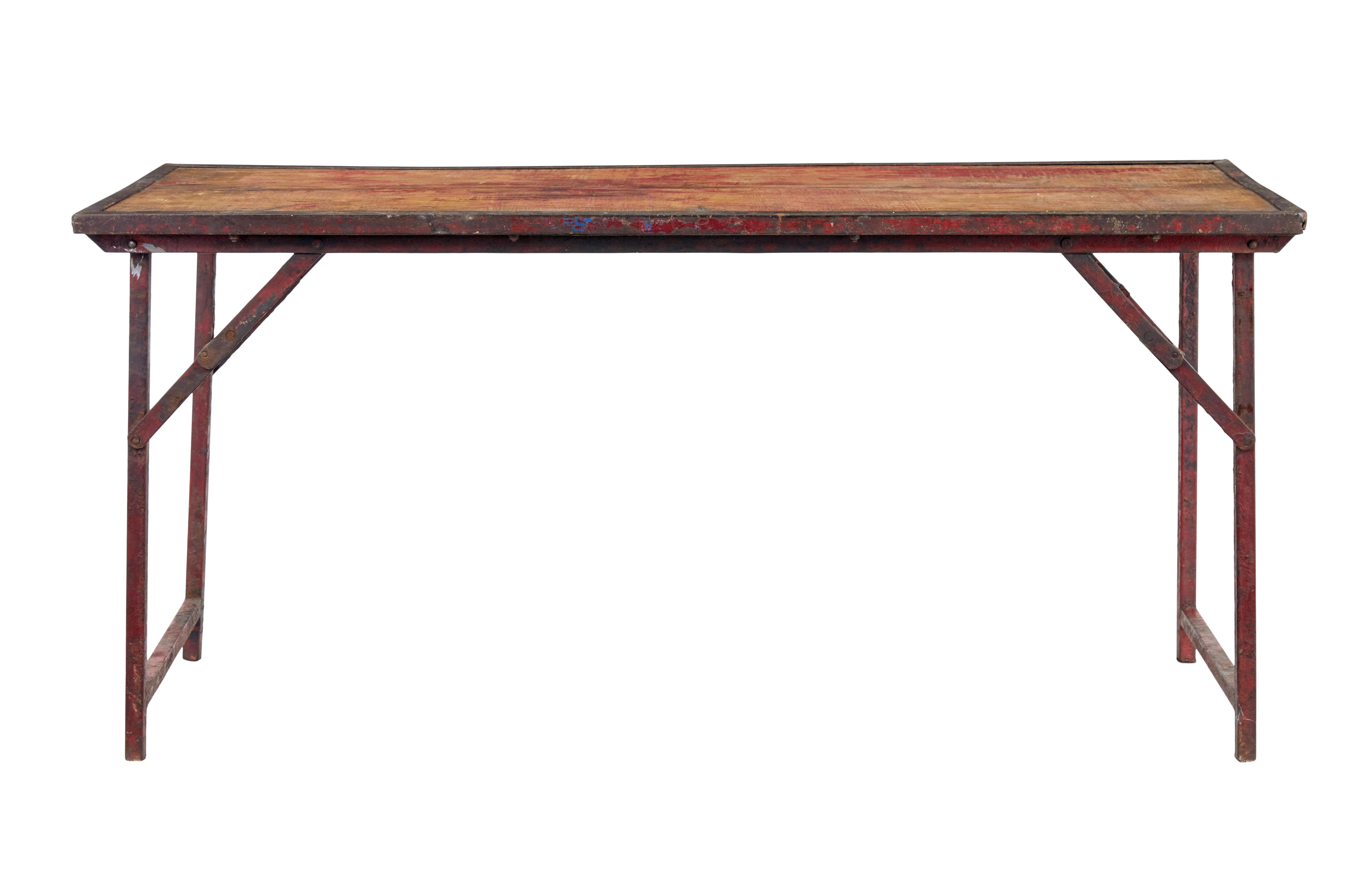 French 1920's painted folding metalwork table.

Good quality table with many practically use's around the home, with the added attraction that it can be used all the time or stored away when not needed.

2 plank top with traces of original paint,