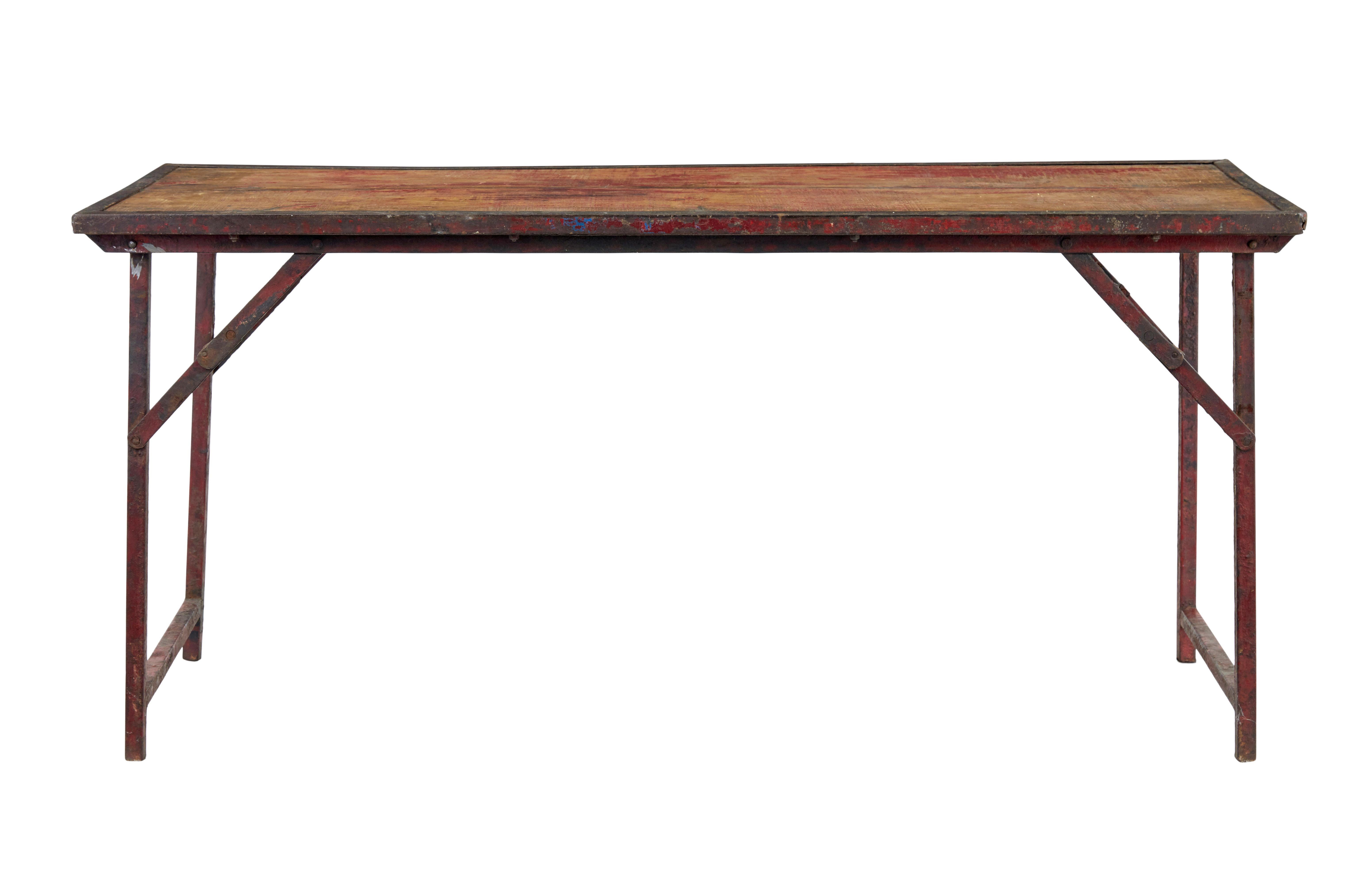 French 1920's painted folding metalwork table.

Good quality table with many practically use's around the home, with the added attraction that it can be used all the time or stored away when not needed.

2 plank top with traces of original paint,